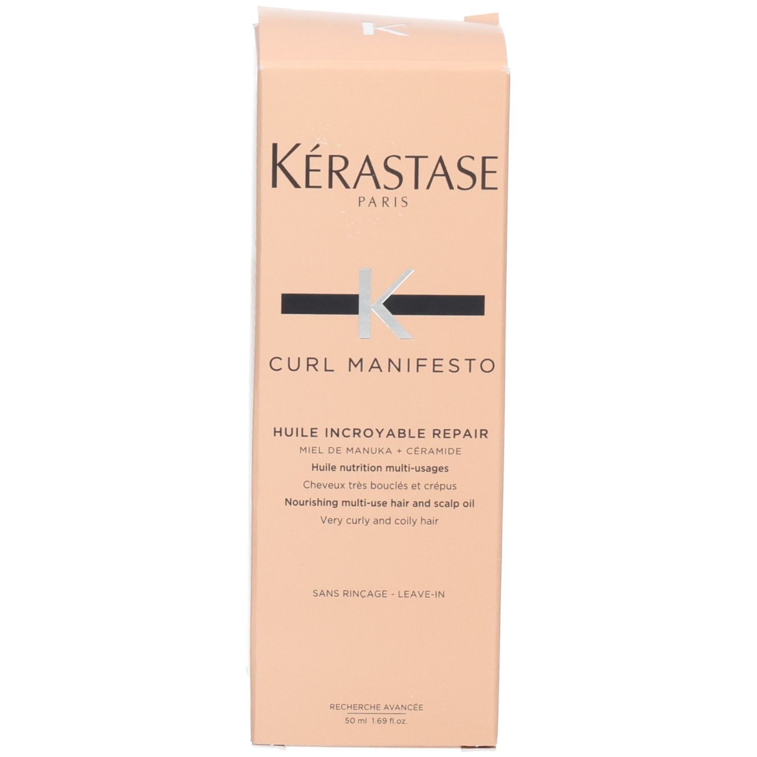 Kérastase Curl Manifesto Huile Sublime Repair Umverpackung mit Produktinformationen.