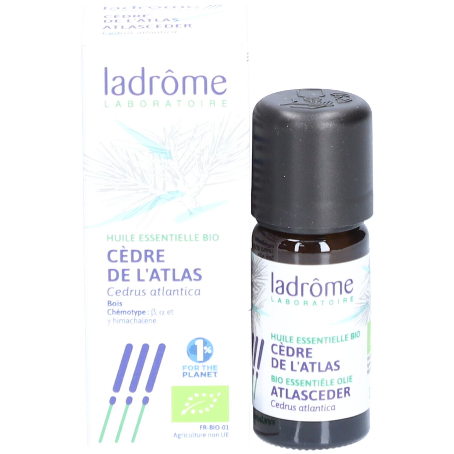Flacon en verre brun avec bouchon noir et étiquette. À côté, une boîte blanche avec informations produit et logo.