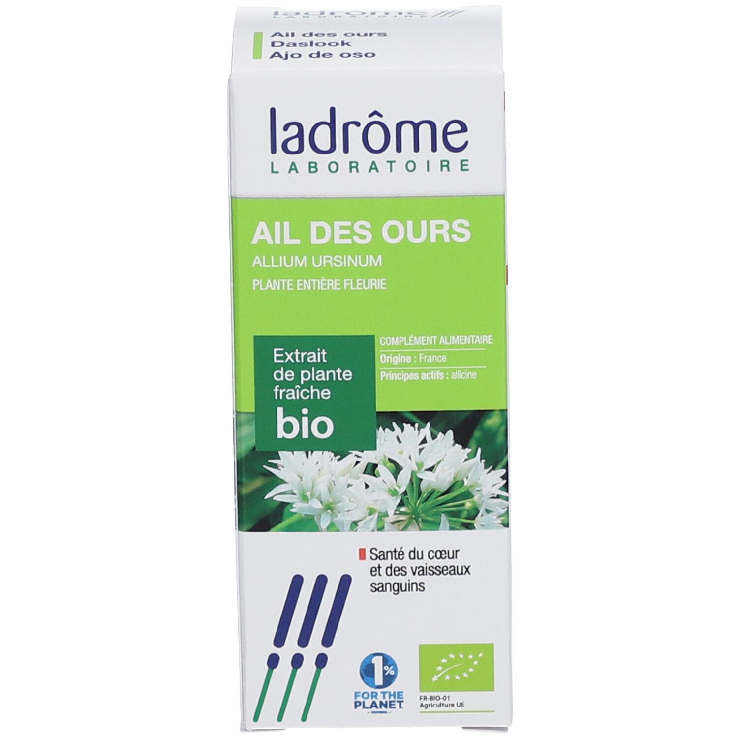 Weiß-grüne Verpackung mit Produktinformationen und Logo. Braune Glasflasche mit weißem Deckel daneben.