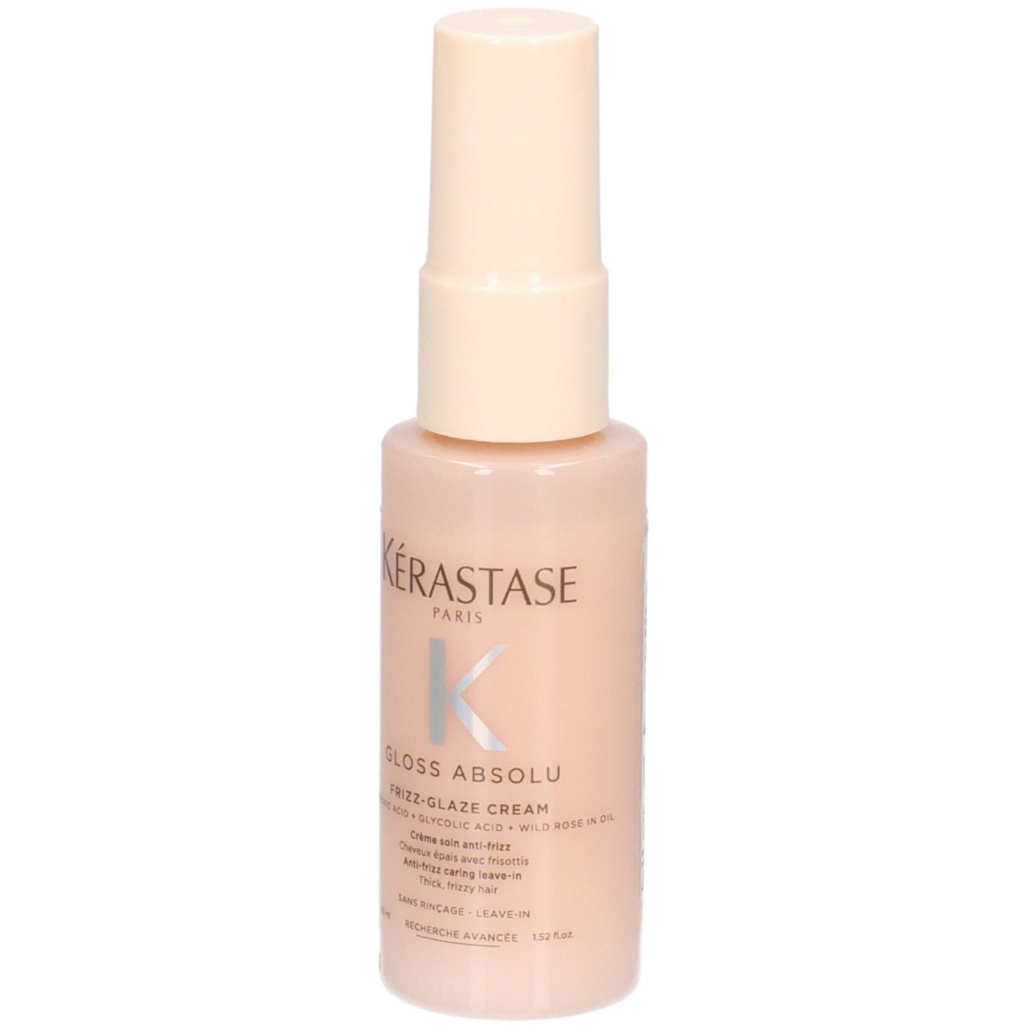 Kérastase Gloss Absolu Frizz-Glaze Cream Mini in einem hellrosa Pumpspender, Vorderansicht.