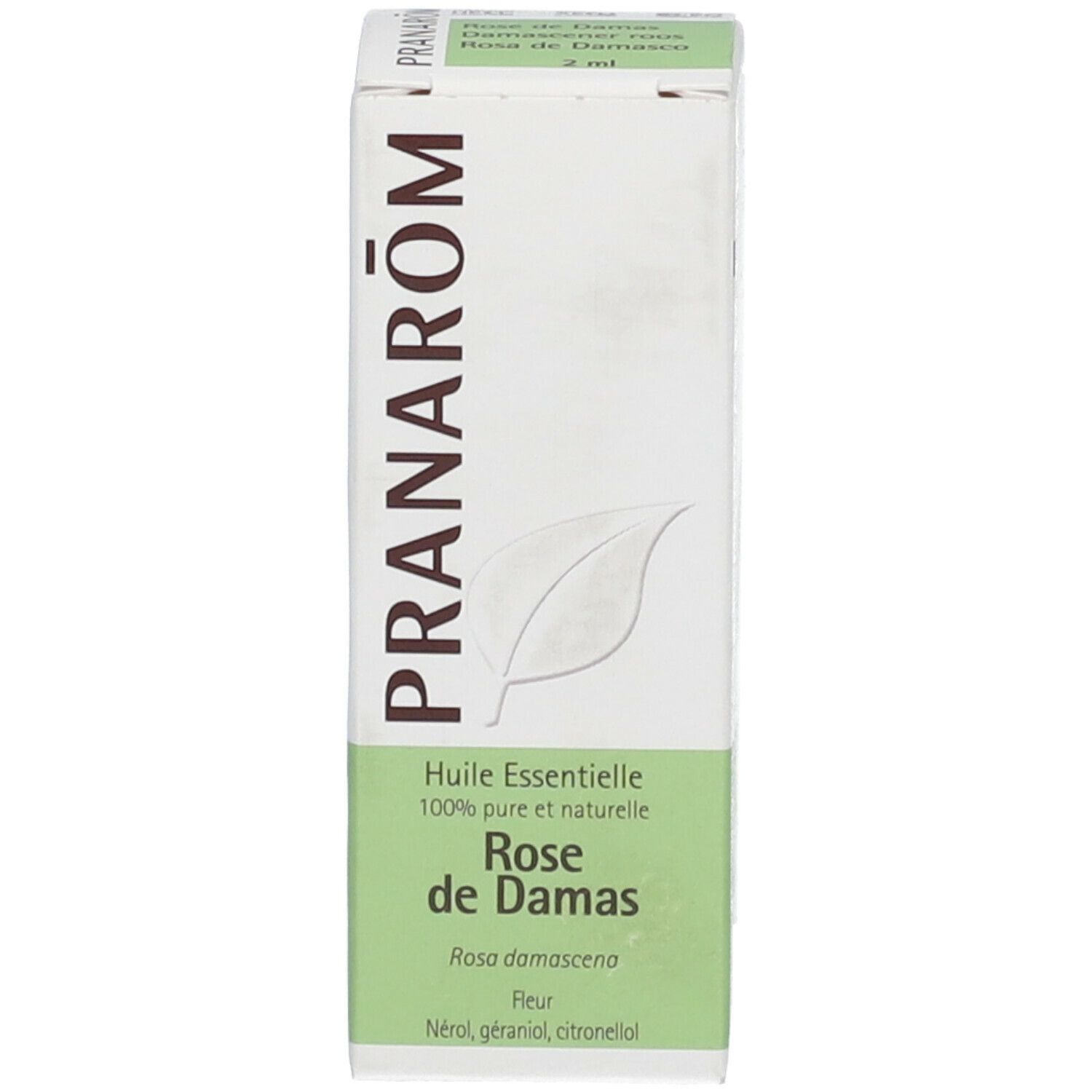 Emballage avec texte: PRANAROM, Rosa de Damas. Texte vert sur fond blanc. Symbole de feuille.