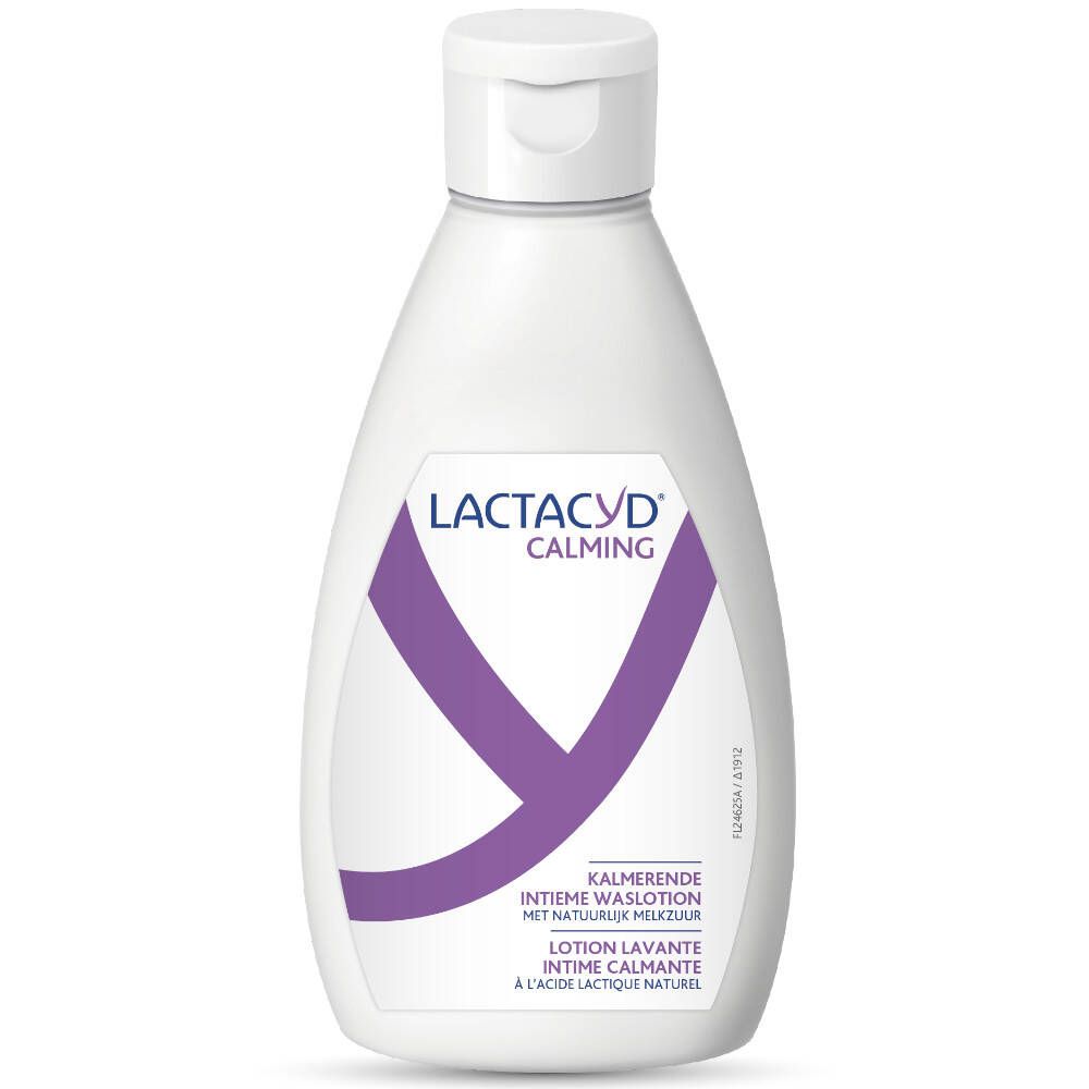 Flacon blanc avec bouchon rabattable. Inscription Lactacyd Calming et symbole Y violet. Texte: Lotion lavante intime calmante.