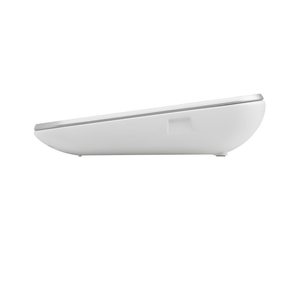 Tensiomètre, vue latérale. Boîtier blanc, bord argenté. Aucun autre détail visible.