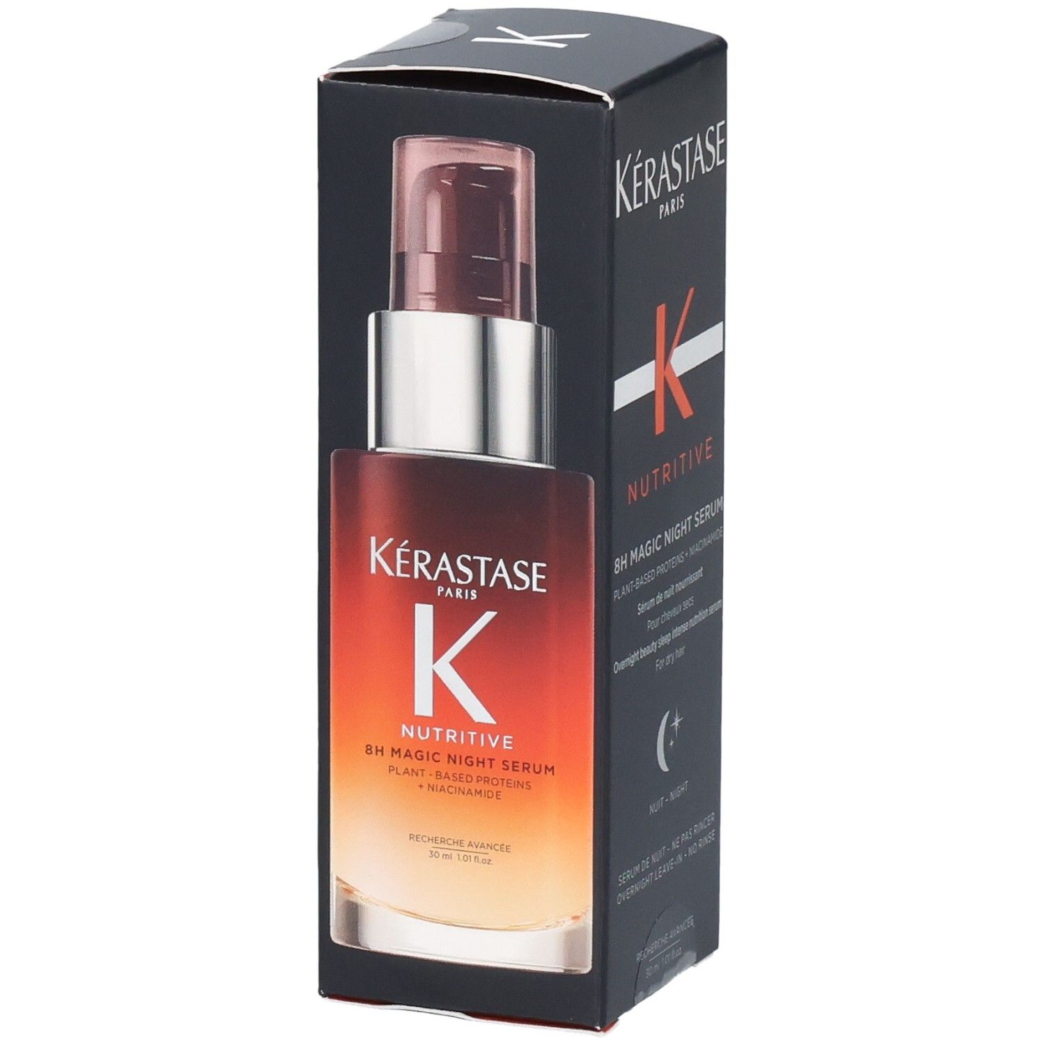Kérastase Nutritive 8h Magic Night Serum Flakon mit Pumpspender, teilweise in der geöffneten Kartonverpackung.
