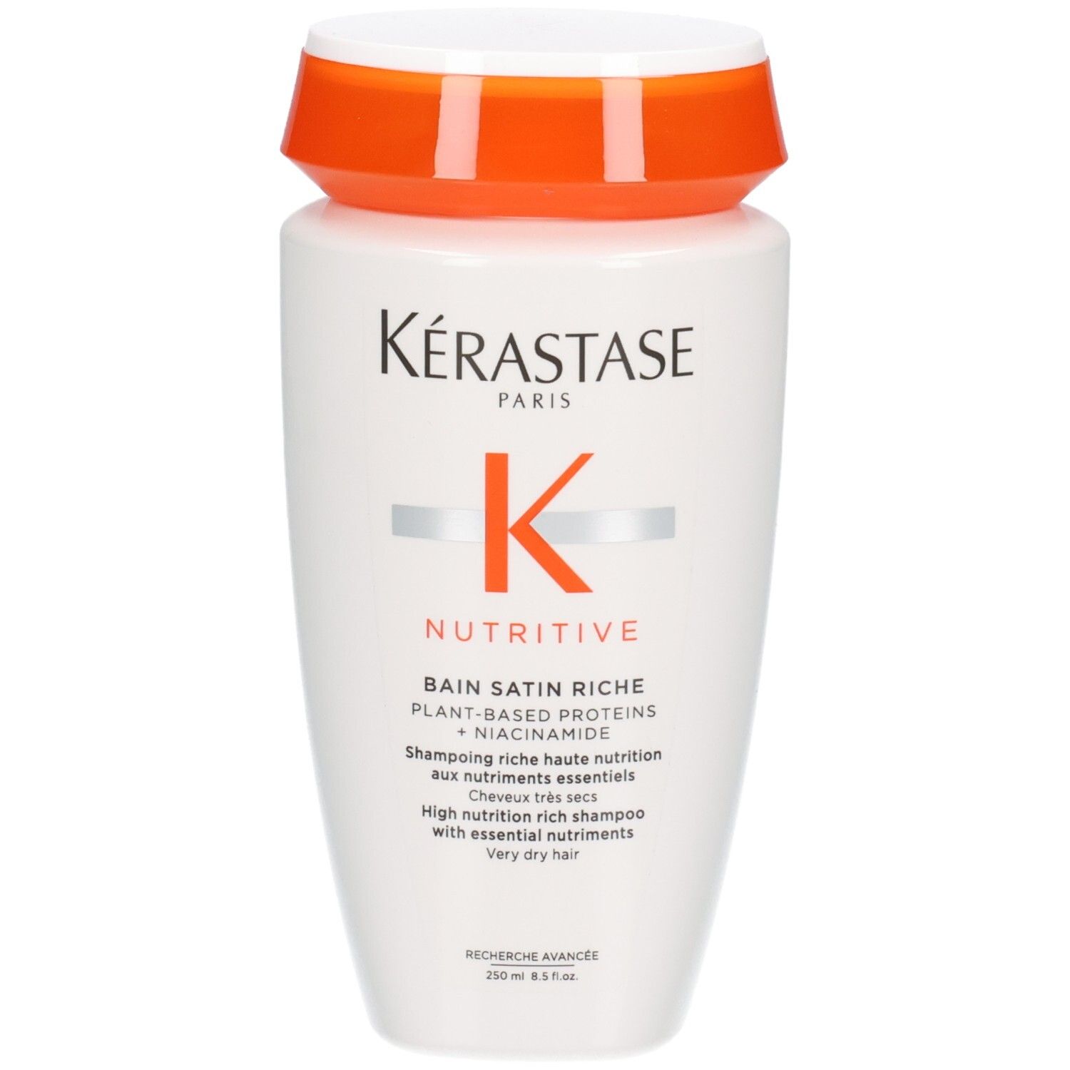 Kérastase Nutritive Bain Satin Riche Shampoo-Flasche mit orangefarbenem Deckel.