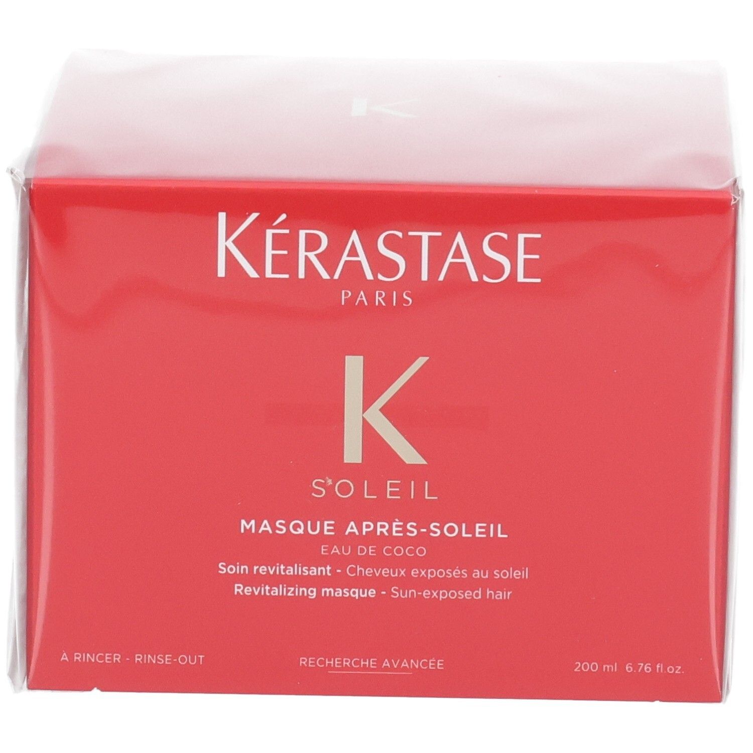 Vorderseite der roten Kérastase Soleil Après-Soleil Verpackung mit Produktbezeichnung und Volumenangabe.