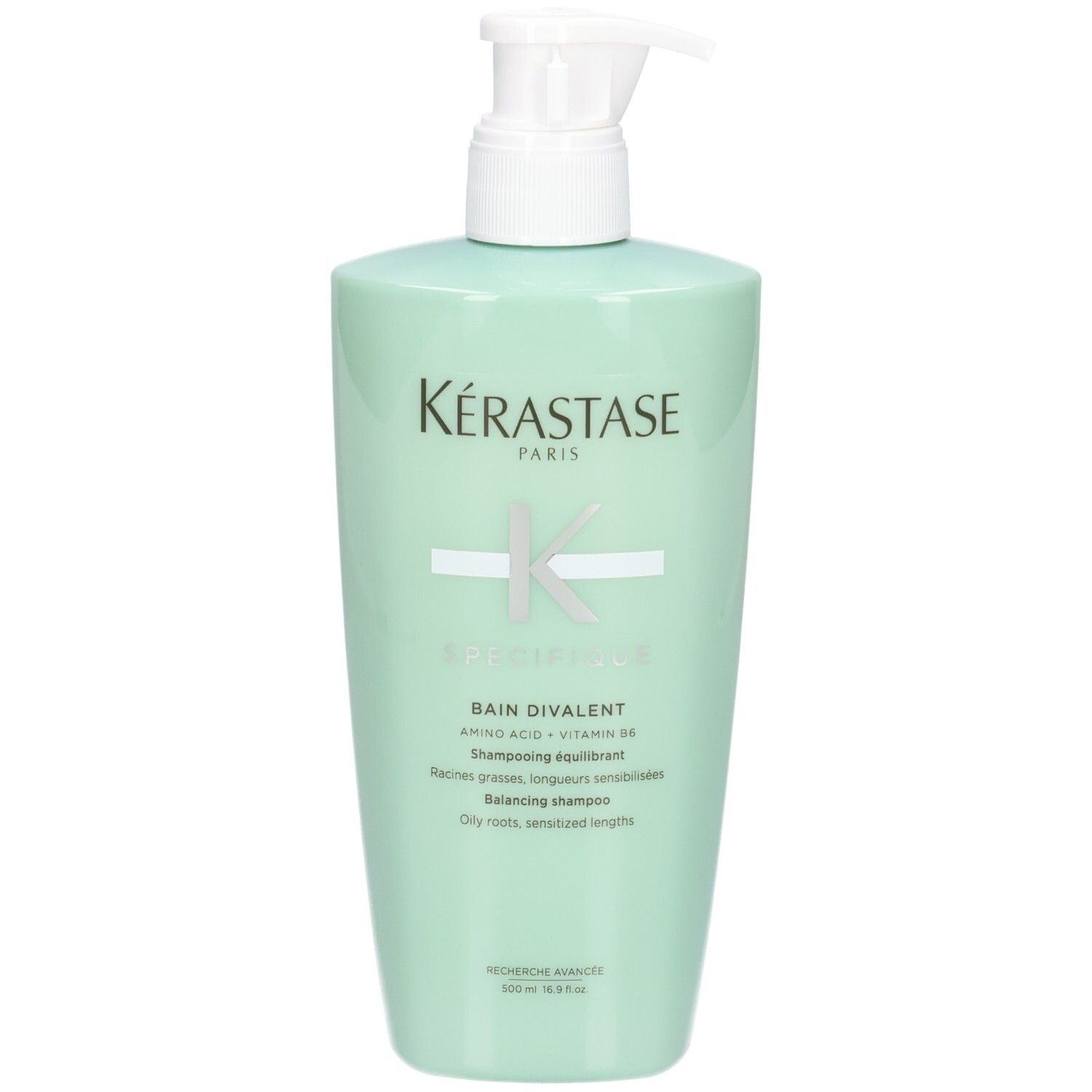 Kérastase Bain Divalent Balancing Shampoo in mintgrüner Flasche mit Pumpspender.