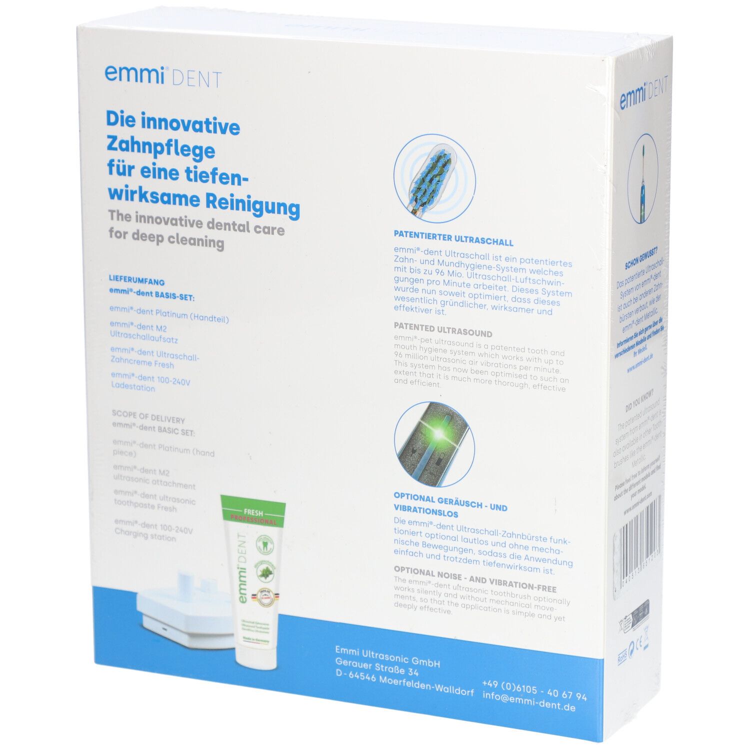 Rückseite der Emmi-Dent Ultraschallzahnbürste Platinum Verpackung. Enthält Produktmerkmale und Zubehör.