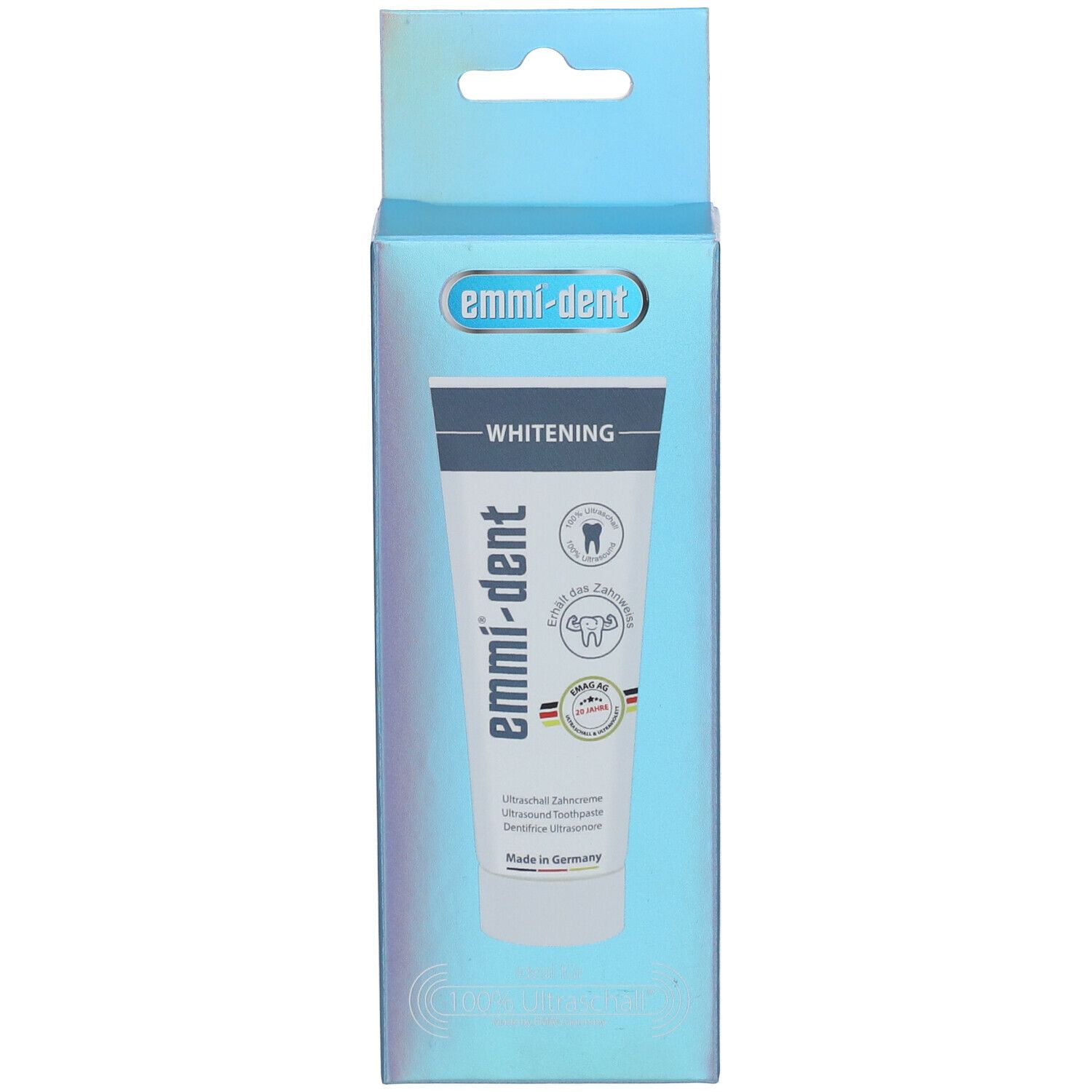 Doos met tandpastatube. "emmi-dent"-logo en "Whitening". Ultrasone tandpasta.