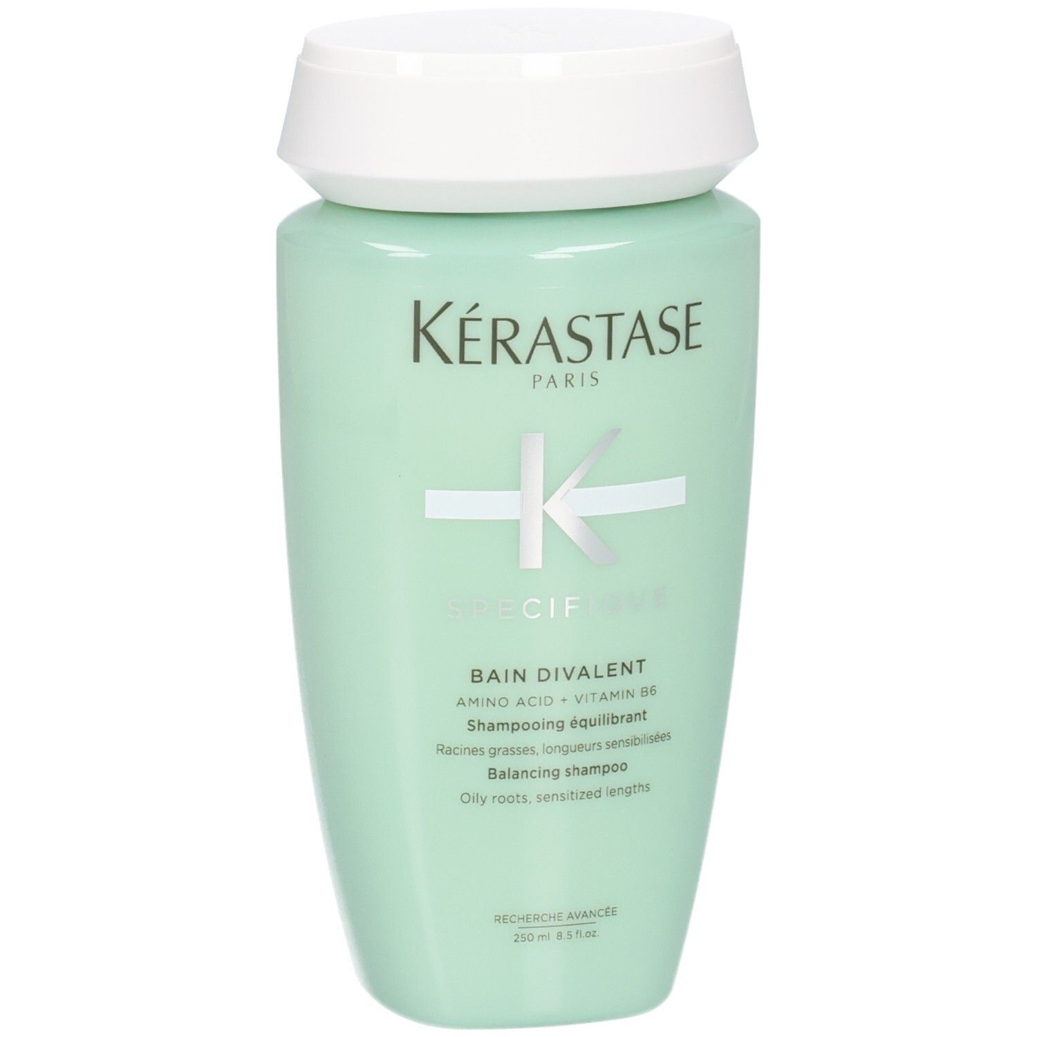 Kérastase Bain Divalent Shampoo, 250ml, mintgrüne Flasche mit weißem Deckel.