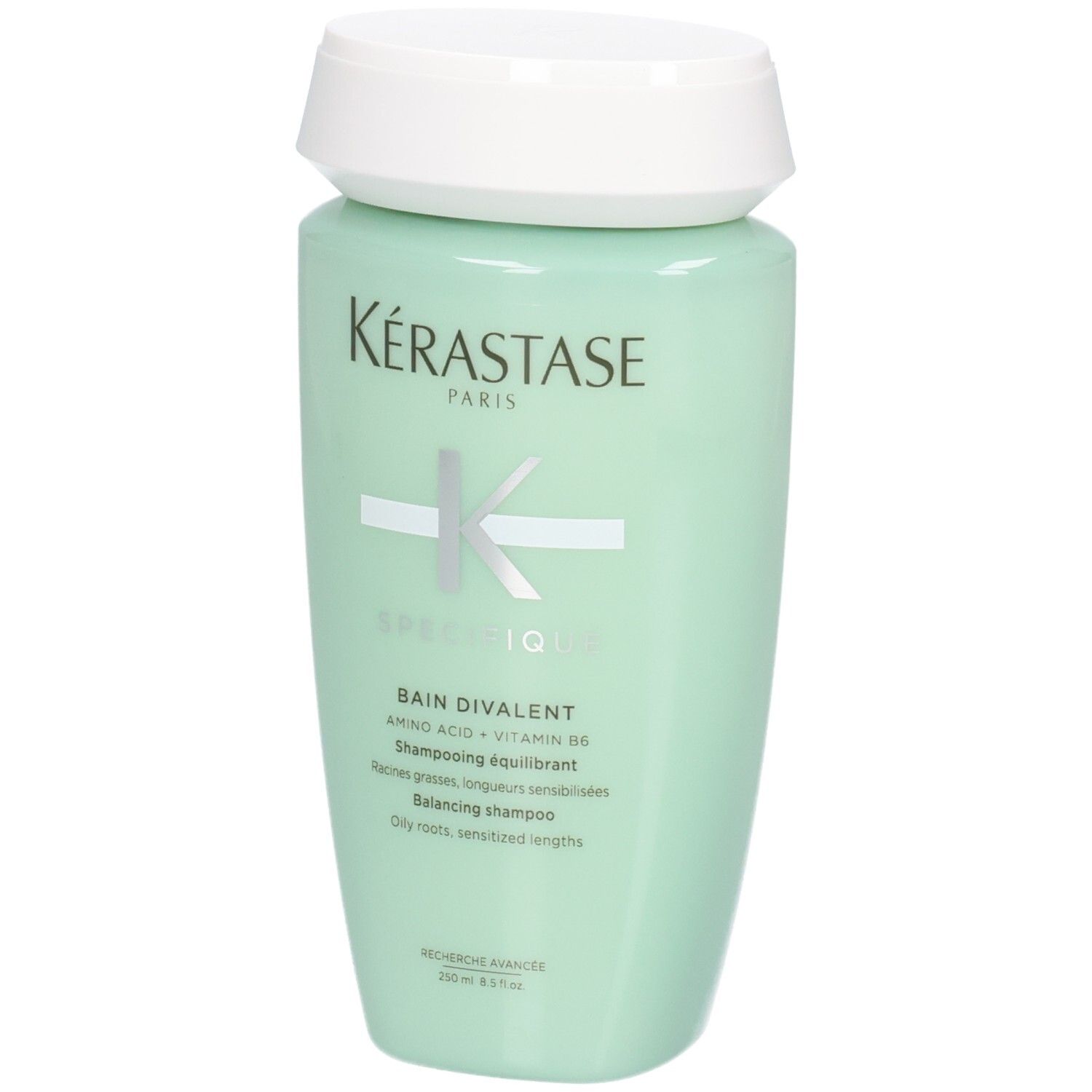 Kérastase Bain Divalent Shampoo, 250ml, mintgrüne Flasche mit weißem Deckel.
