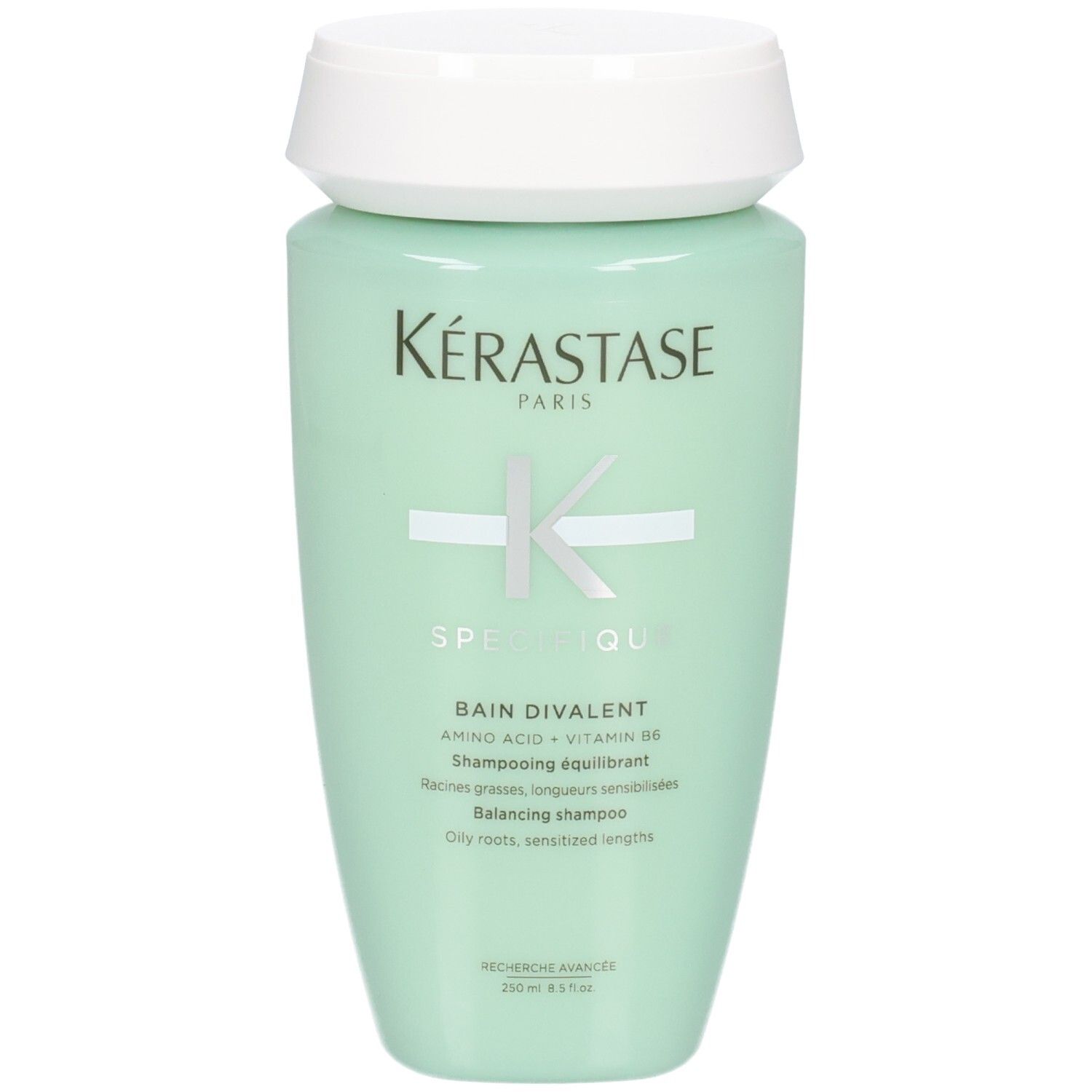 Kérastase Bain Divalent Shampoo, 250ml, mintgrüne Flasche mit weißem Deckel.