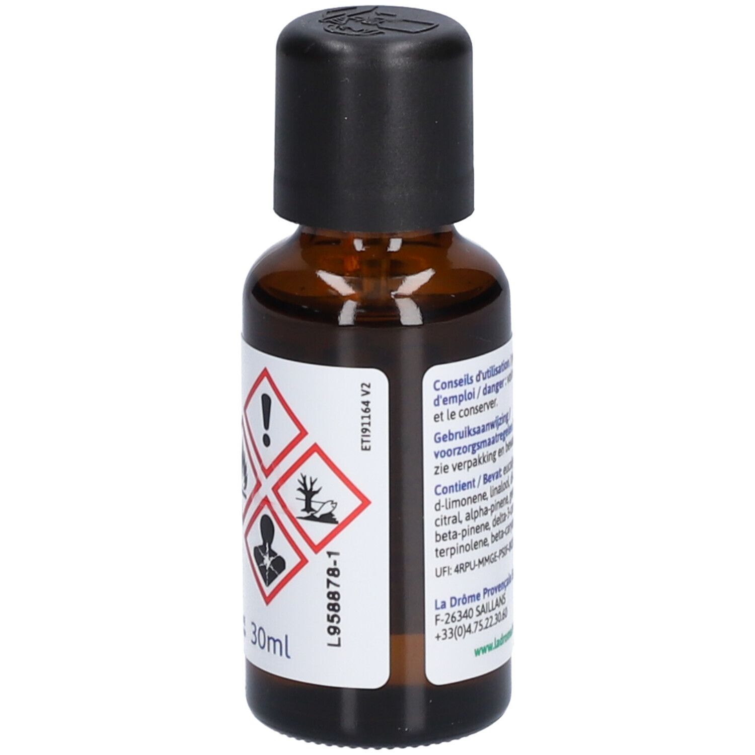 Bruine glazen fles met zwarte dop. Etiket met waarschuwingssymbolen en tekst. 30ml.