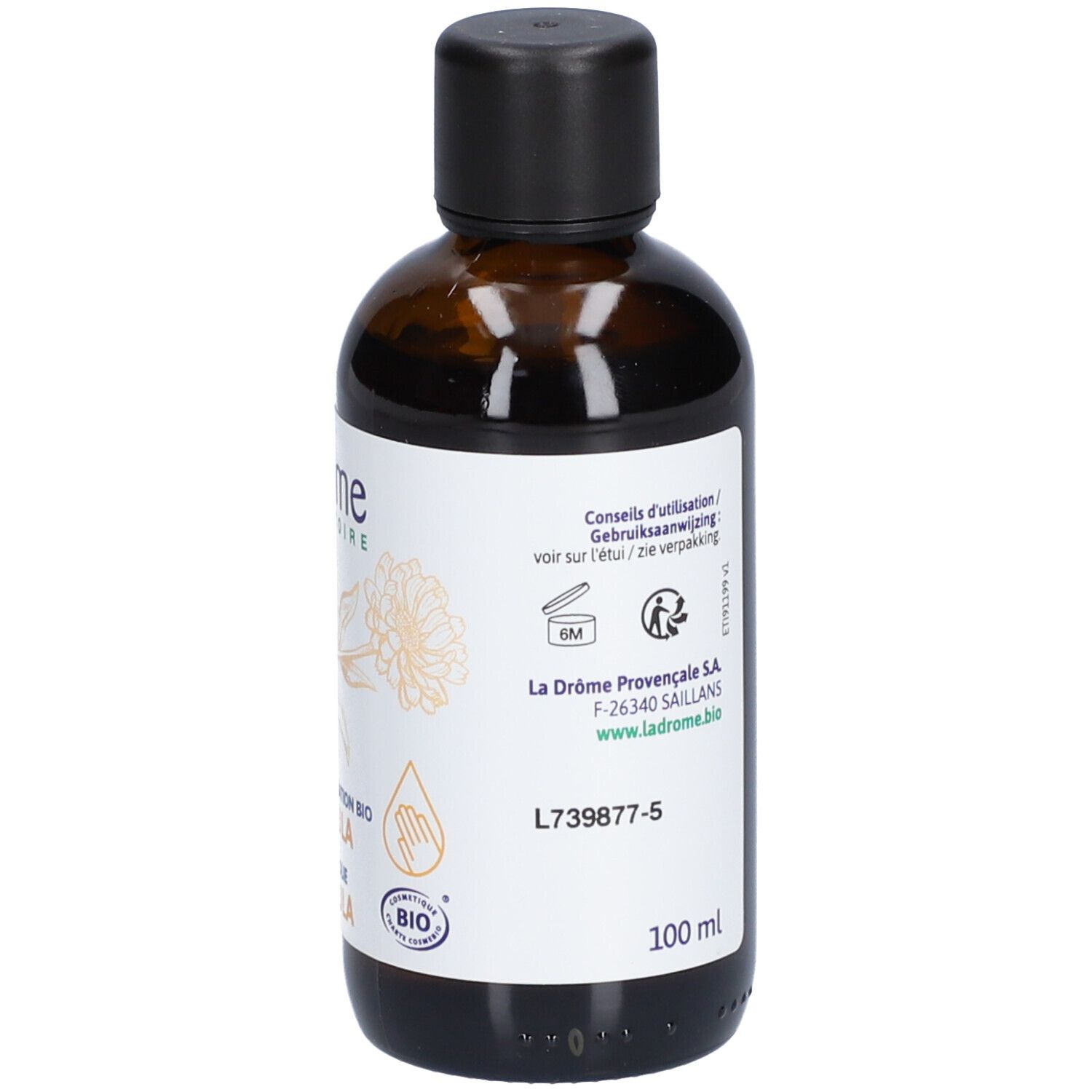 Bruine glazen fles met zwarte dop. Etiket met info en houdbaarheidsaanduiding.