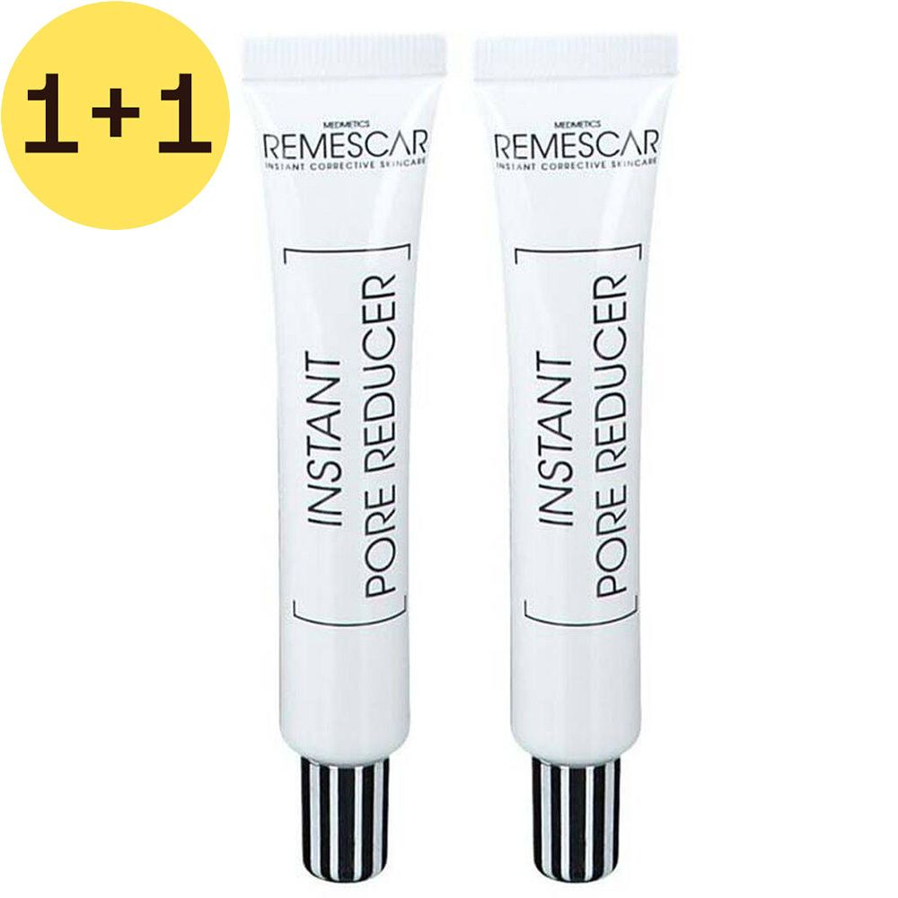 Twee witte tubes met zwarte doppen. Opschrift: Instant Pore Reducer. Geel 1+1 symbool.