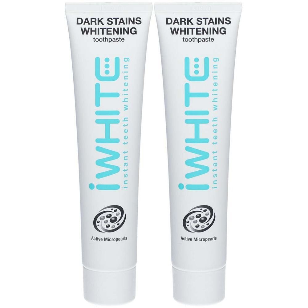 Deux tubes de dentifrice iWhite. Inscription: Dark Stains Whitening, instant teeth whitening. En bas: Active Micropearts.