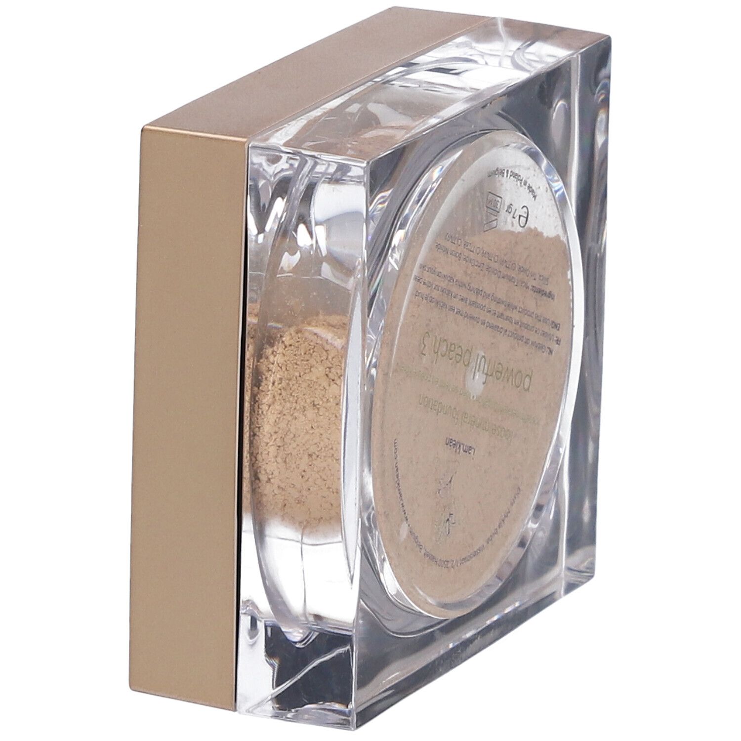 Transparante vierkante cosmeticaverpakking. Inhoud: los poeder. Op deksel: productinformatie en 'Powerful Peach 3'.