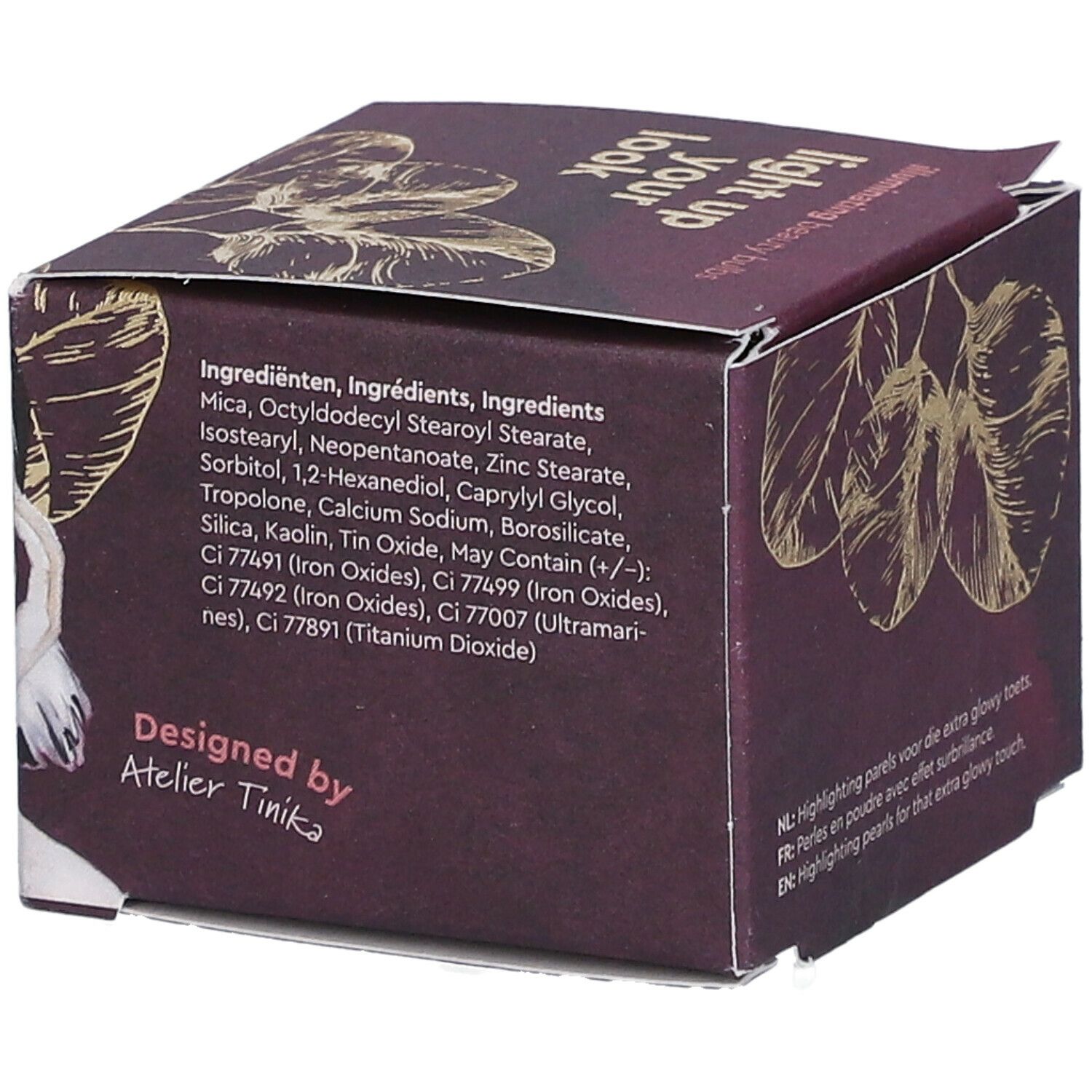 Kartonverpackung mit Text. Auf der Seite: Zutatenliste und Design-Informationen.