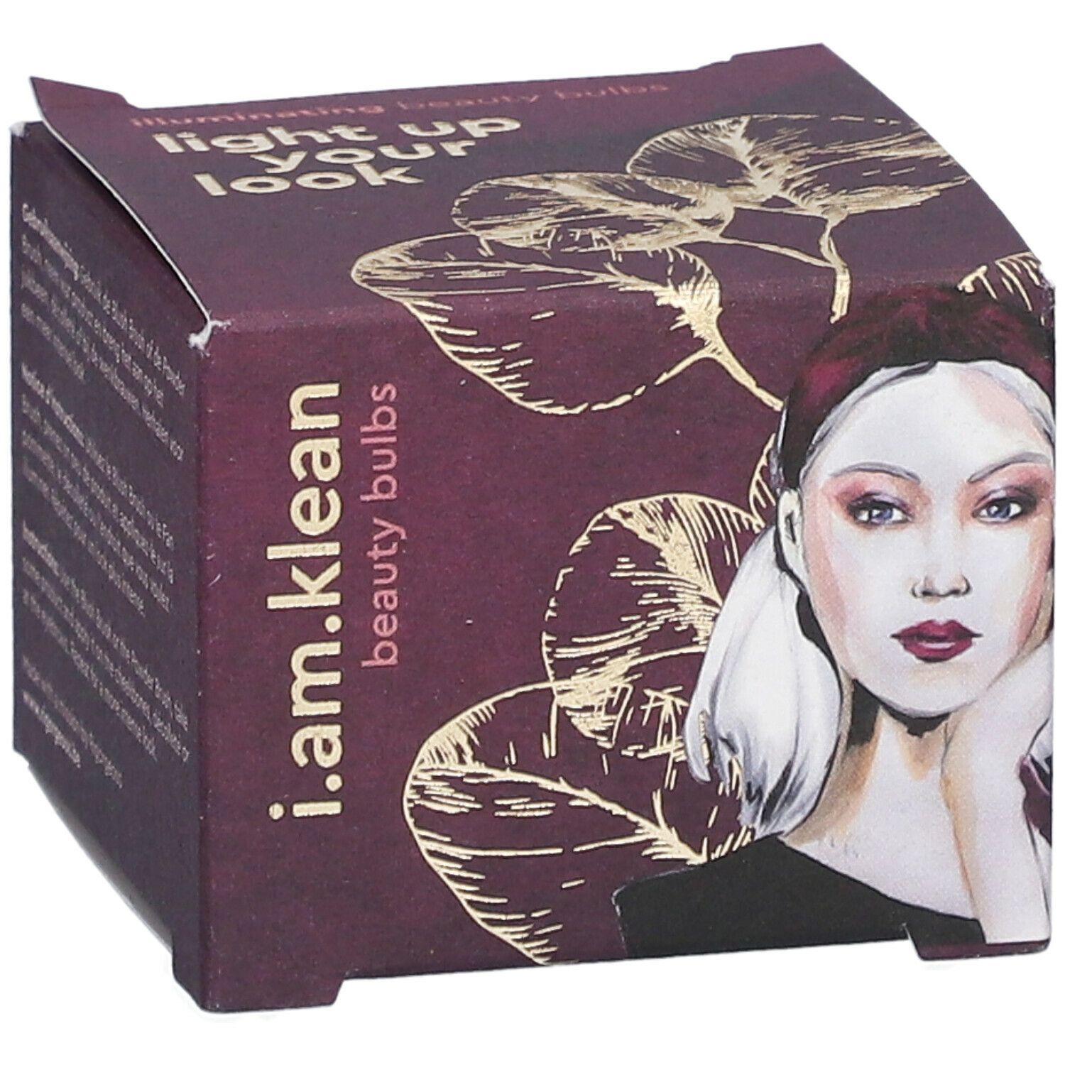 Kartonverpackung mit Aufdruck. Auf der Vorderseite: Illustration einer Frau, Produktname und Logo.
