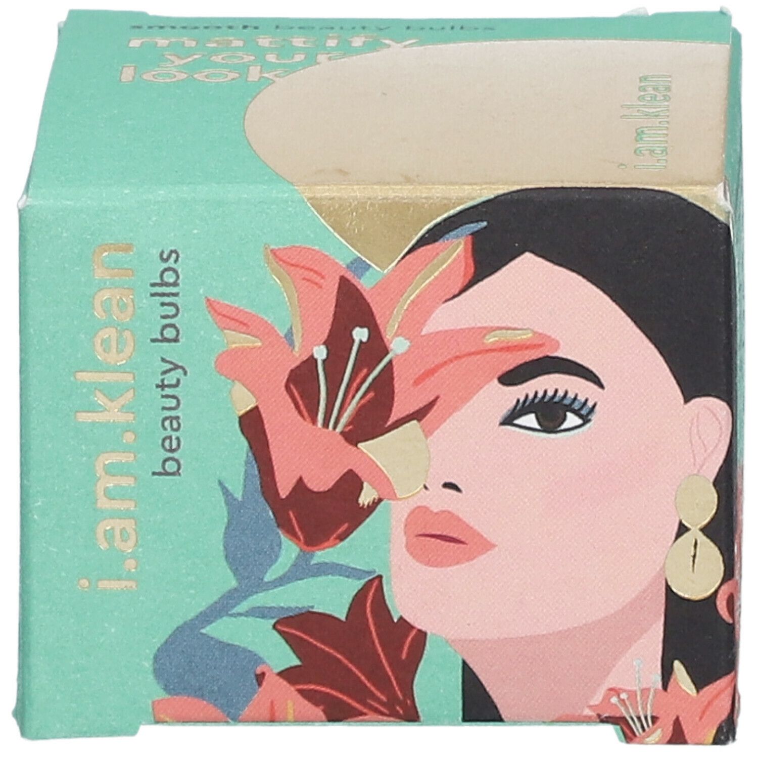 Türkisgrüne Kartonverpackung mit Illustration einer Frau und Blumen. Text: i.am.klean beauty bulbs.