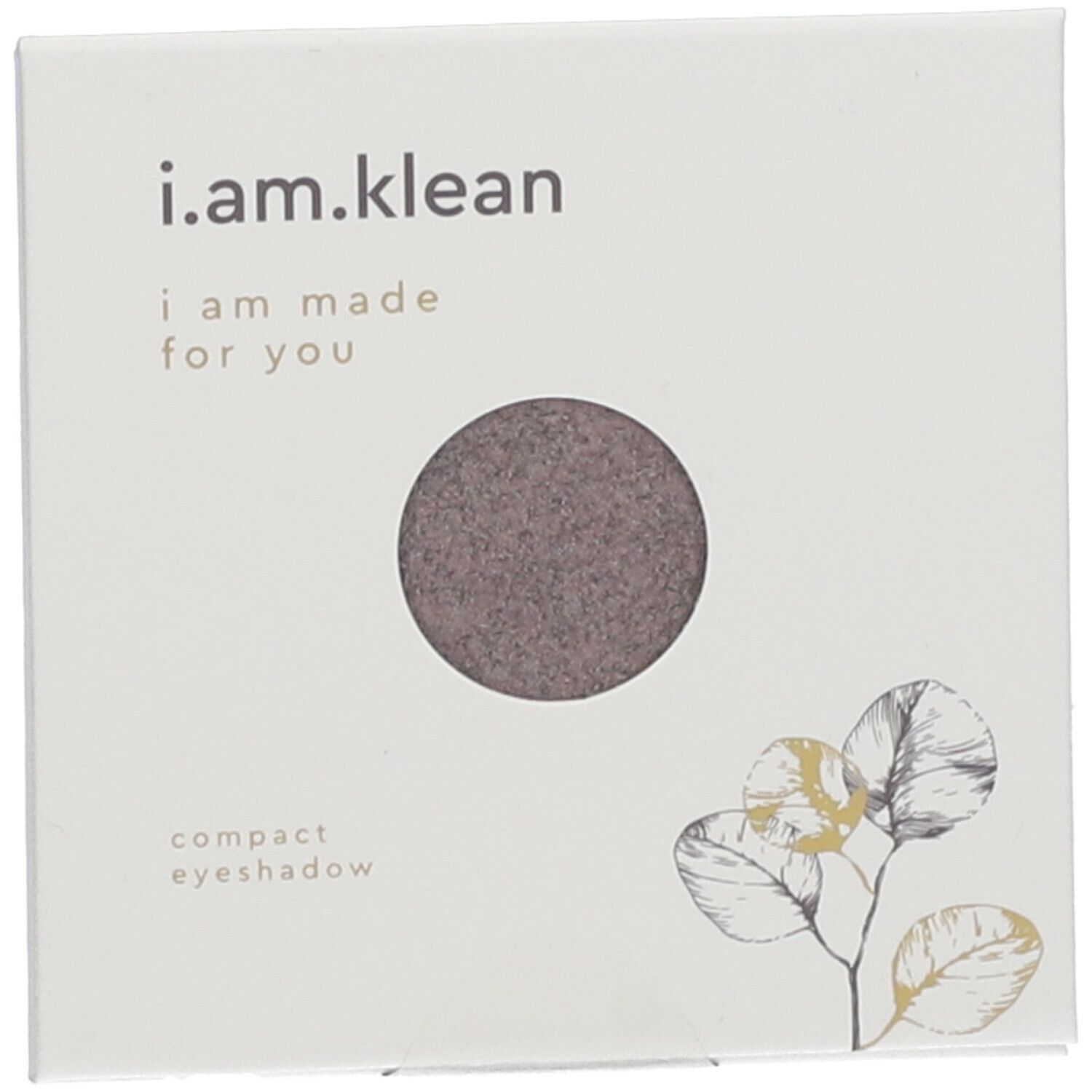 Vierkante witte verpakking met ronde bruine oogschaduw. Boven: "i.am.klean", daaronder "i am made for you". Bloemen decoratie.