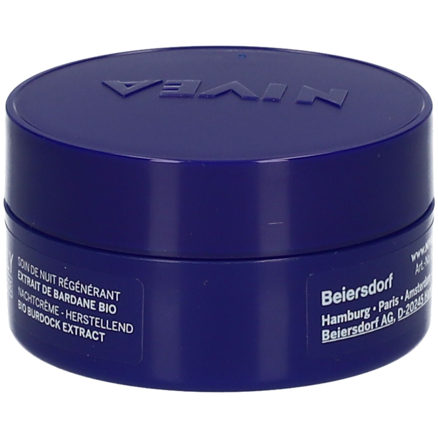 Pot de crème bleu avec couvercle. Inscription : NIVEA. Texte : Crème de nuit, extrait de bardane bio, Beiersdorf.