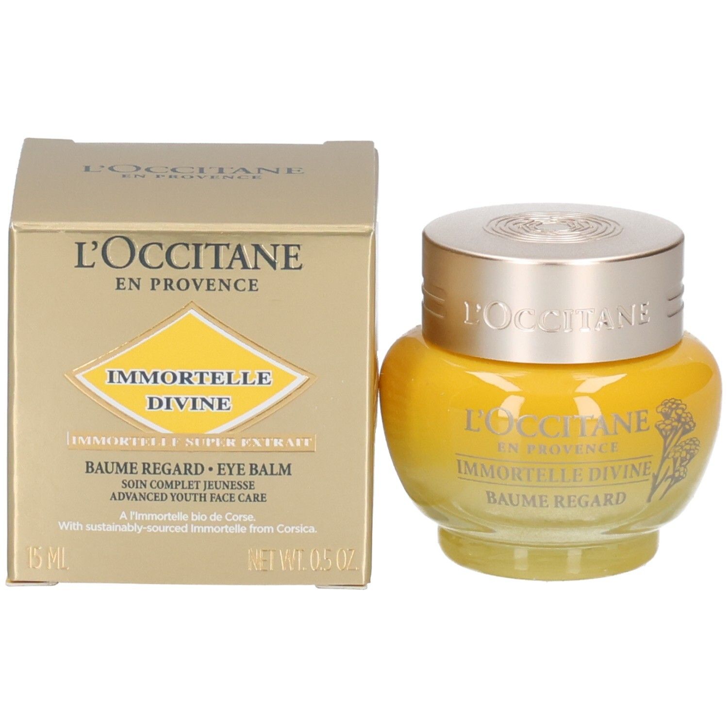 L'OCCITANE Immortelle Divine Augenbalsam und Umverpackung, goldener Karton mit Produktinformationen.