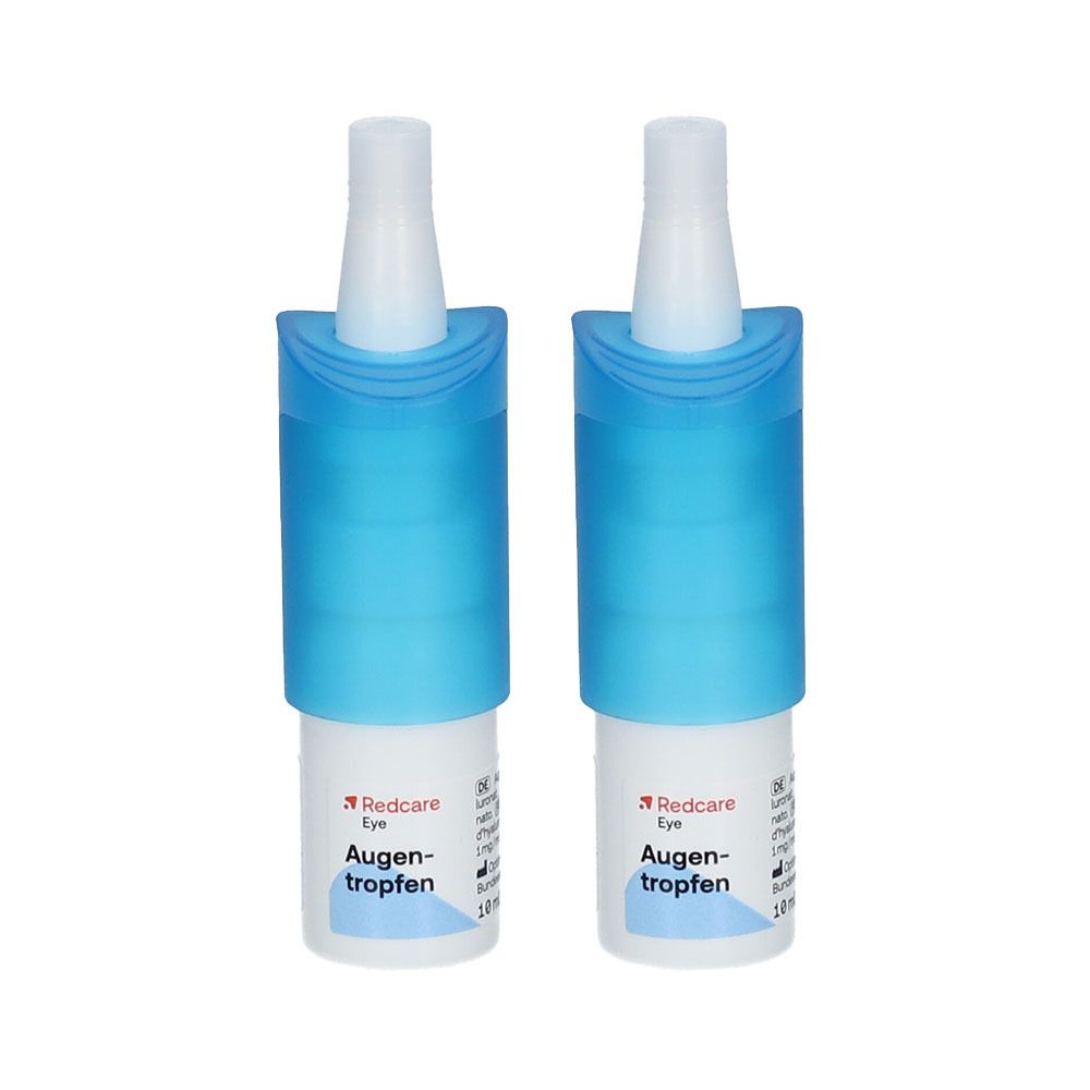 Twee flesjes Redcare oogdruppels met blauwe doppen. Witte flesjes met blauwe doppen, productnaam en logo zichtbaar.
