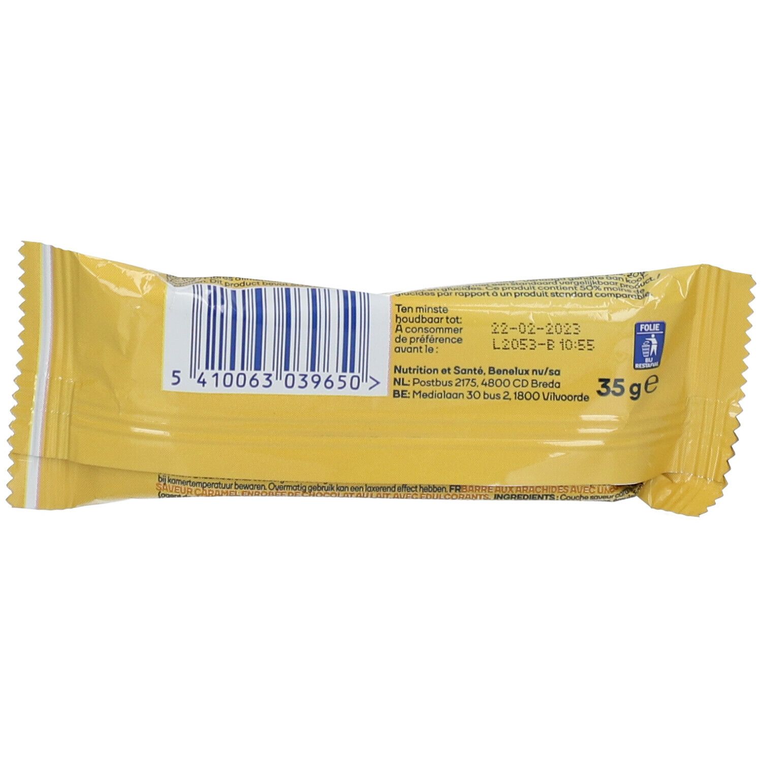 Emballage de barre. Film jaune avec code-barres, date de péremption et indication de poids : 35 g.