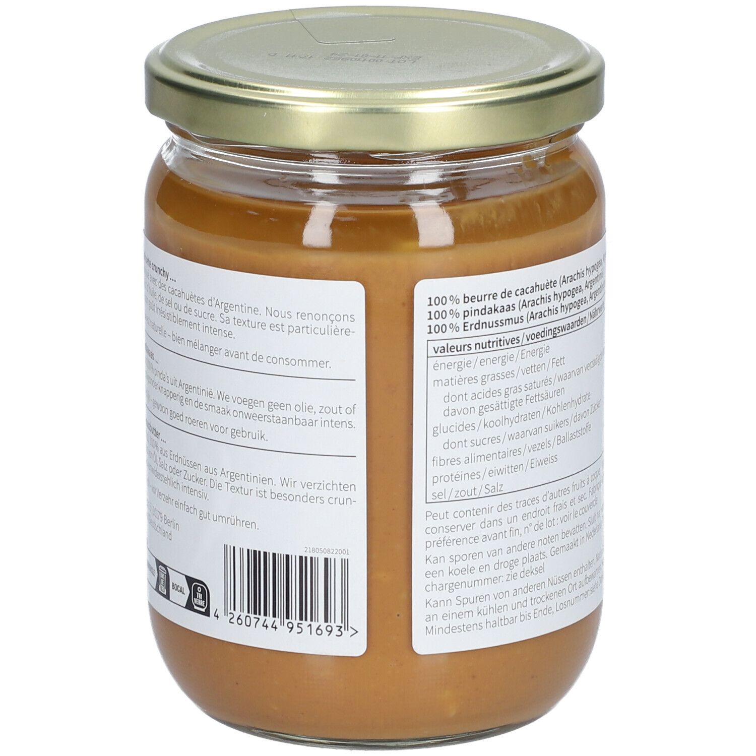 Rückseite des Glases mit Erdnussbutter. Etikett mit Text in mehreren Sprachen und Barcode.