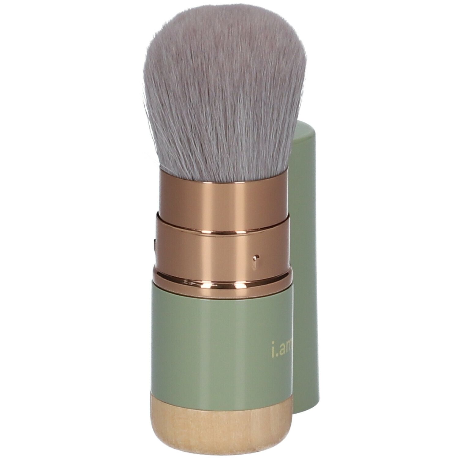 i.am.klean Versenkbarer Kabuki-kwast. Groene handgreep, gouden elementen, grijze haren. Dop ernaast.