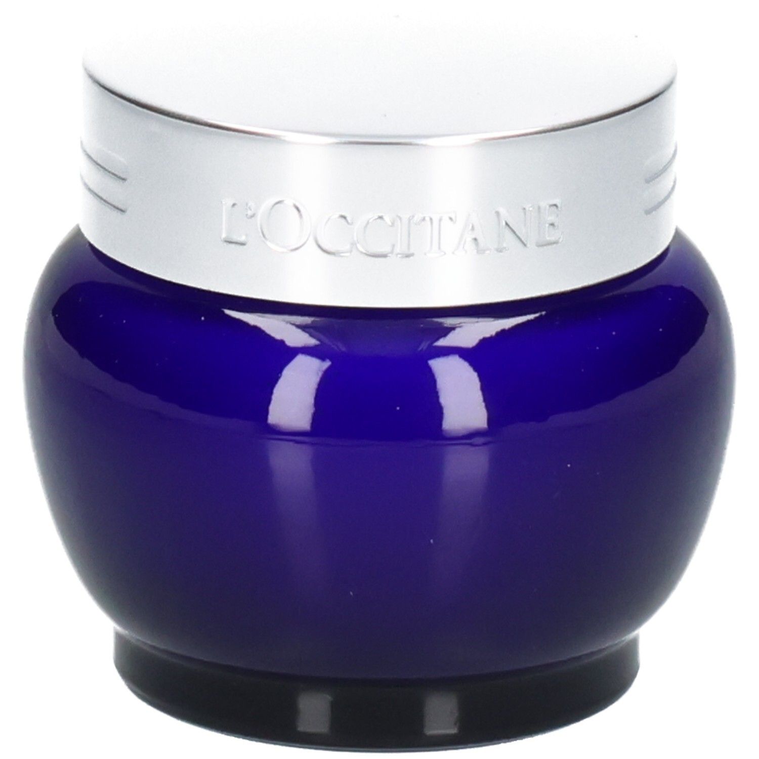 L'OCCITANE Immortelle Précieuse Creme in einem blauen Glasbehälter mit silbernem Deckel.