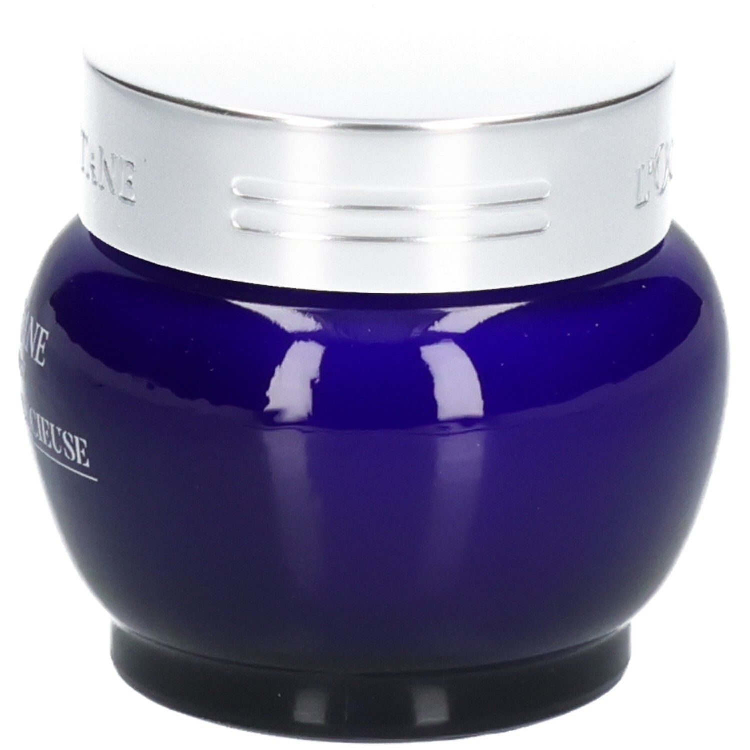 L'OCCITANE Immortelle Précieuse Creme in einem blauen Glasbehälter mit silbernem Deckel.