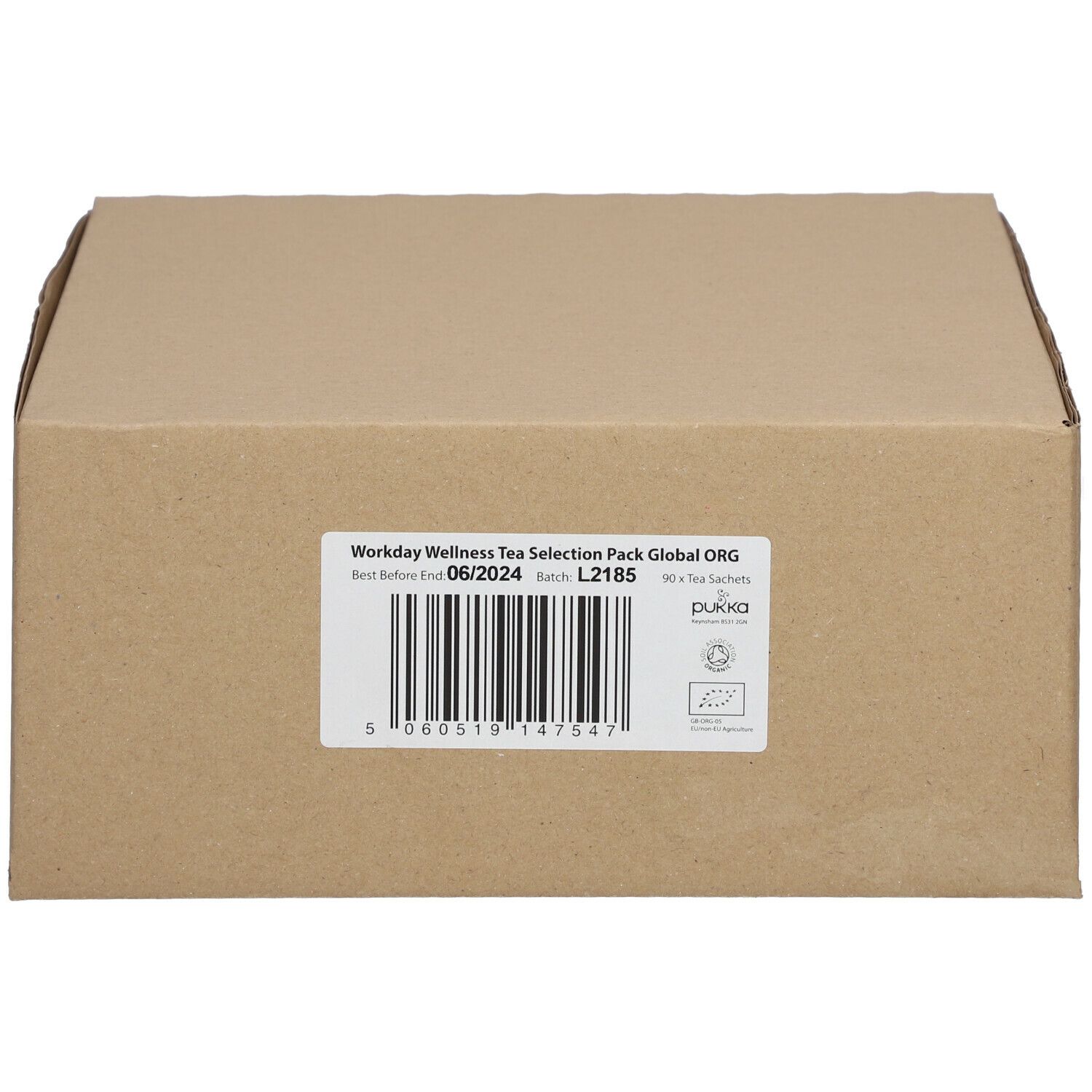 Boîte en carton avec l'inscription "Workday Wellness Tea Selection Pack". Étiquette avec date de péremption et code-barres.