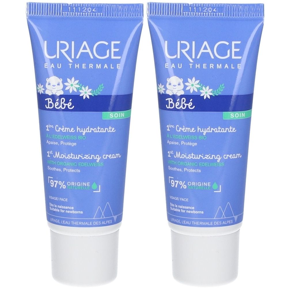 Zwei blaue Tuben mit Produktaufdruck. Aufschrift: URIAGE Bébé, 1. Crème hydratante, 1. Moisturizing cream. 97% origine naturelle.
