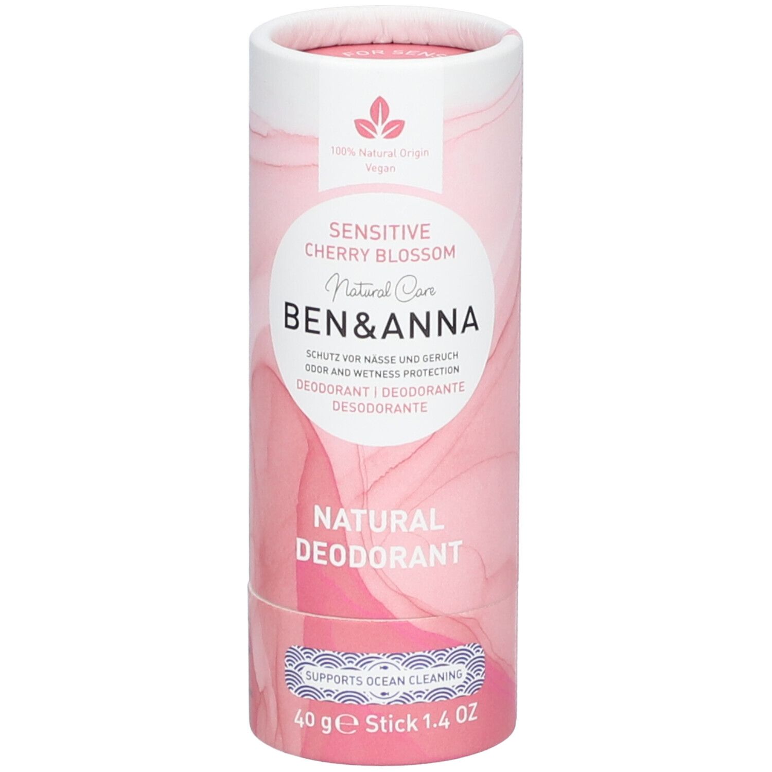 Emballage cylindrique. Design rose et blanc. Inscription: Sensitive Cherry Blossom, Natural Care, Ben & Anna, Natural Deodorant. Stick 40 g.