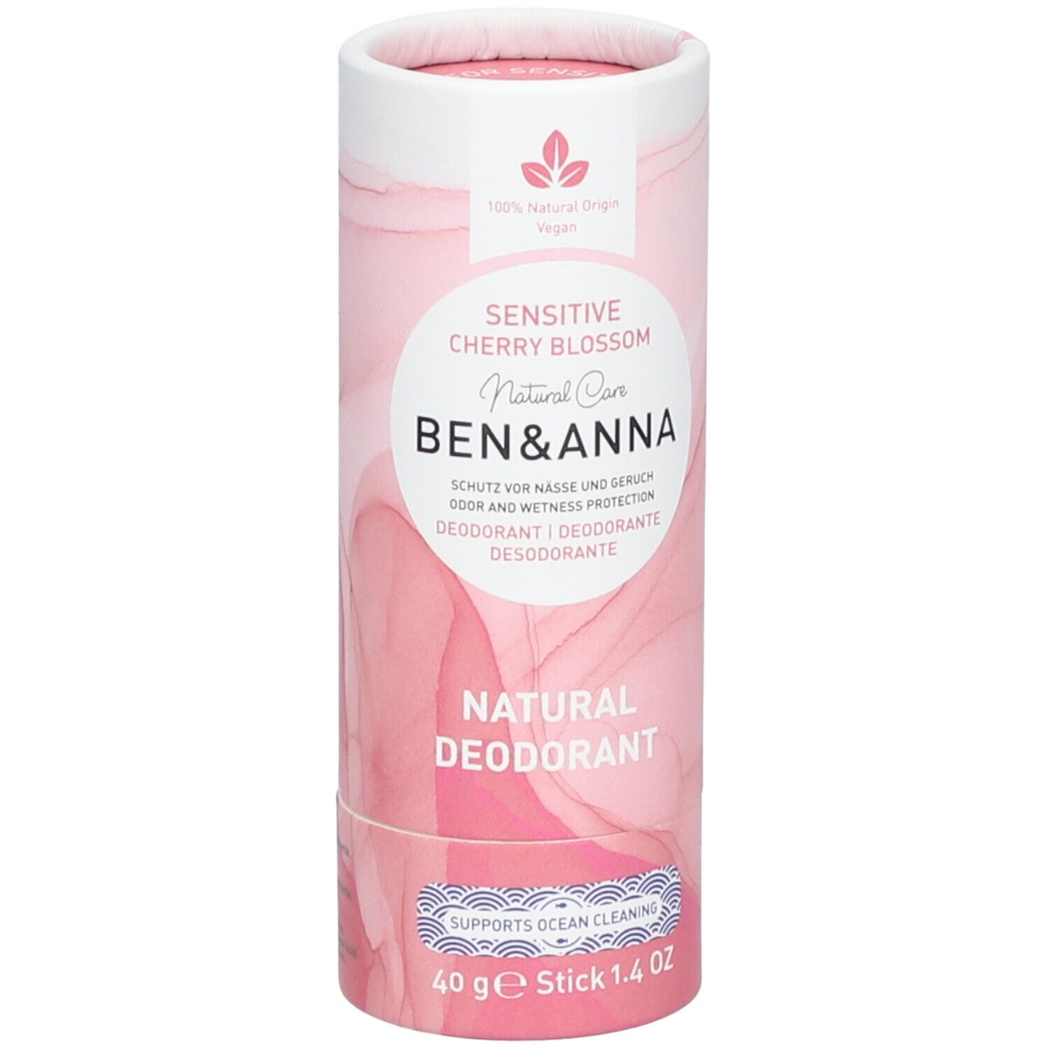 Emballage cylindrique. Design rose et blanc. Inscription: Sensitive Cherry Blossom, Ben & Anna, Natural Deodorant. Stick 40 g.