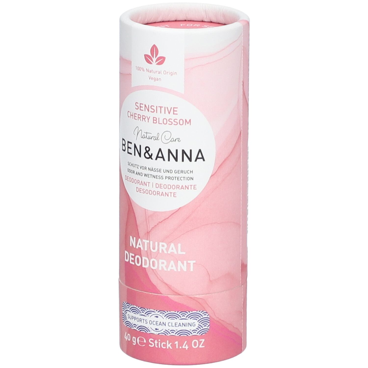 Emballage cylindrique. Design rose et blanc. Inscription: Sensitive Cherry Blossom, Ben & Anna, Natural Deodorant. Stick 40 g.