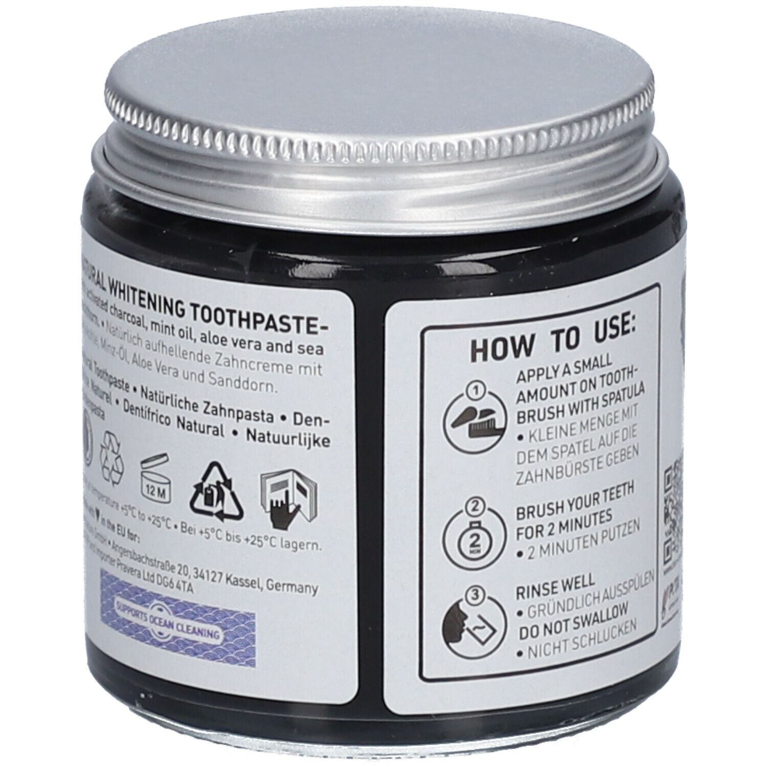 Rückseite des Zahnpasta-Glases. Text: NATURAL WHITENING TOOTHPASTE, Inhaltsstoffe, Recycling-Symbole, Adresse.