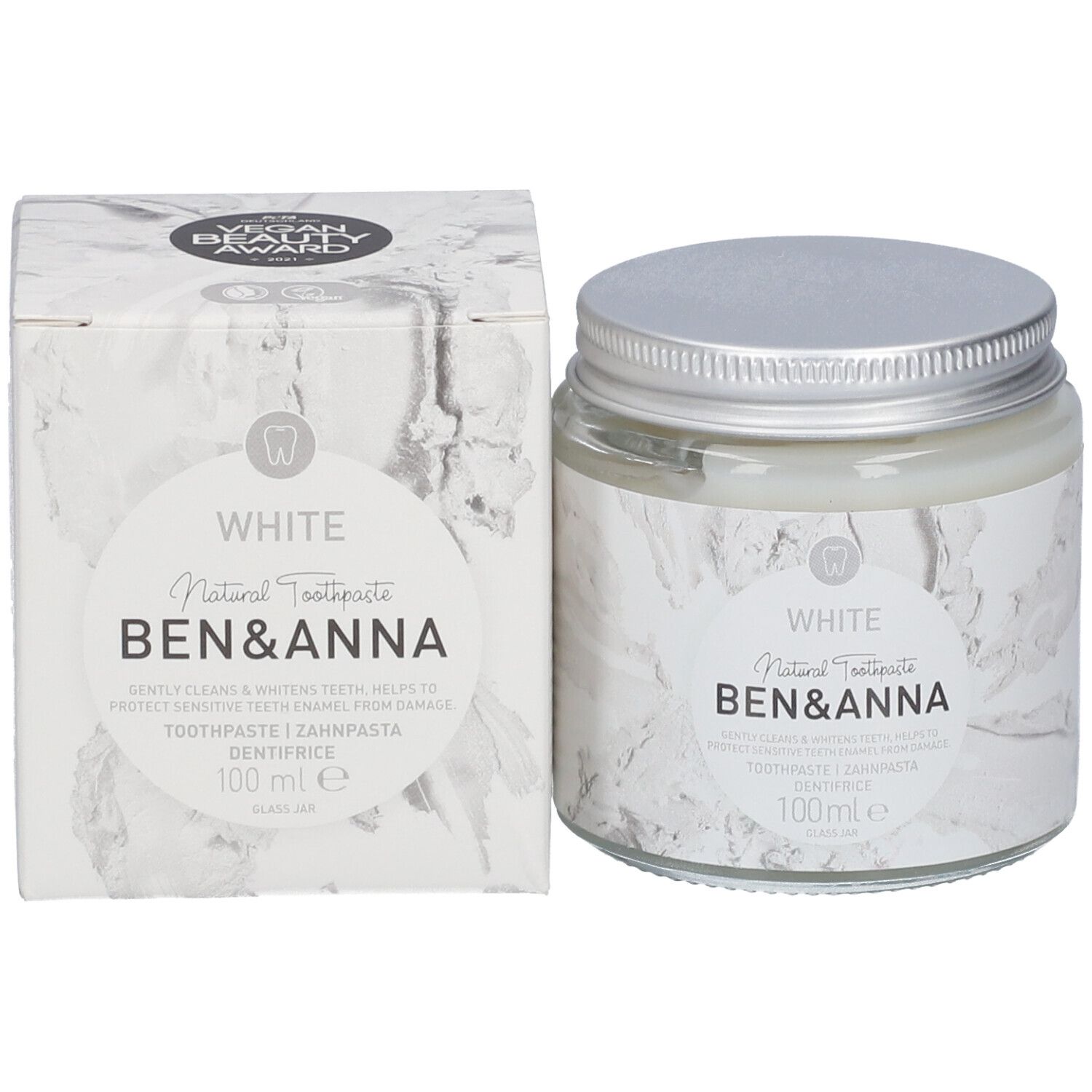 Zahnpasta-Glasgefäß und Karton. Beide mit Produktinformationen und Markenlogo. Vegan Beauty Award.
