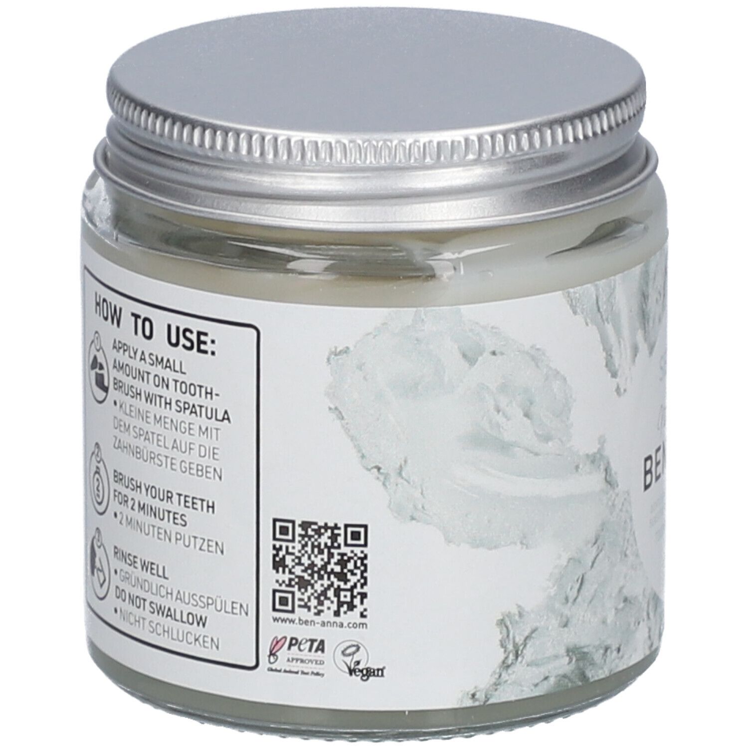 Dos du pot de dentifrice. Inscription : How to use. Code QR. Logo PETA. Logo Vegan.
