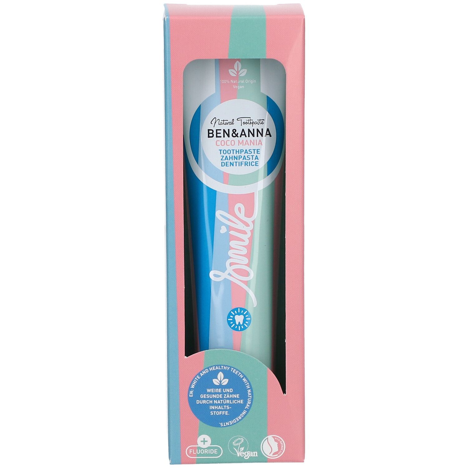 Dentifrice dans son emballage. Marque : Ben & Anna. Emballage rose, bleu et vert avec fenêtre. Inscription : Smile, Coco Mania.
