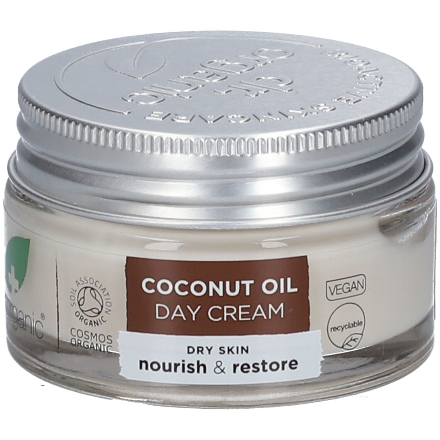 Crèmepot met deksel. Label: COCONUT OIL DAY CREAM, DRY SKIN, nourish & restore. Vegan-zegel.