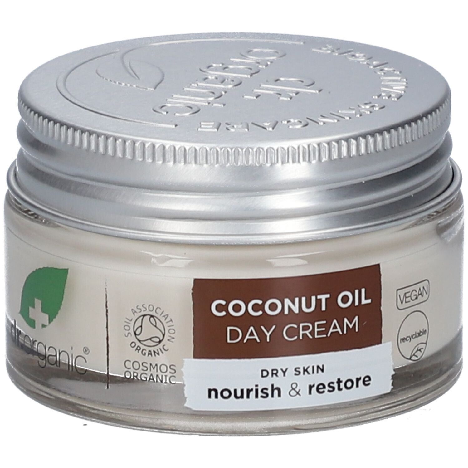 Crèmepot met deksel. Label: COCONUT OIL DAY CREAM, DRY SKIN, nourish & restore. Vegan-zegel.
