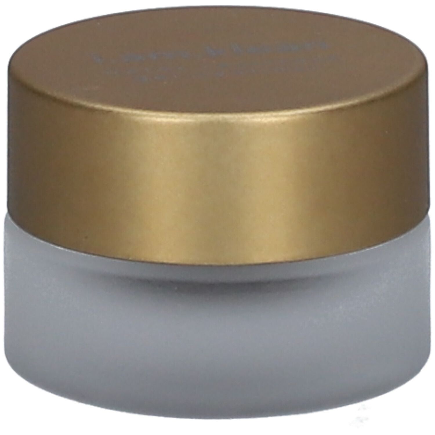 Runder, matter Behälter mit goldenem Deckel. Produkt für die Augenpartie.