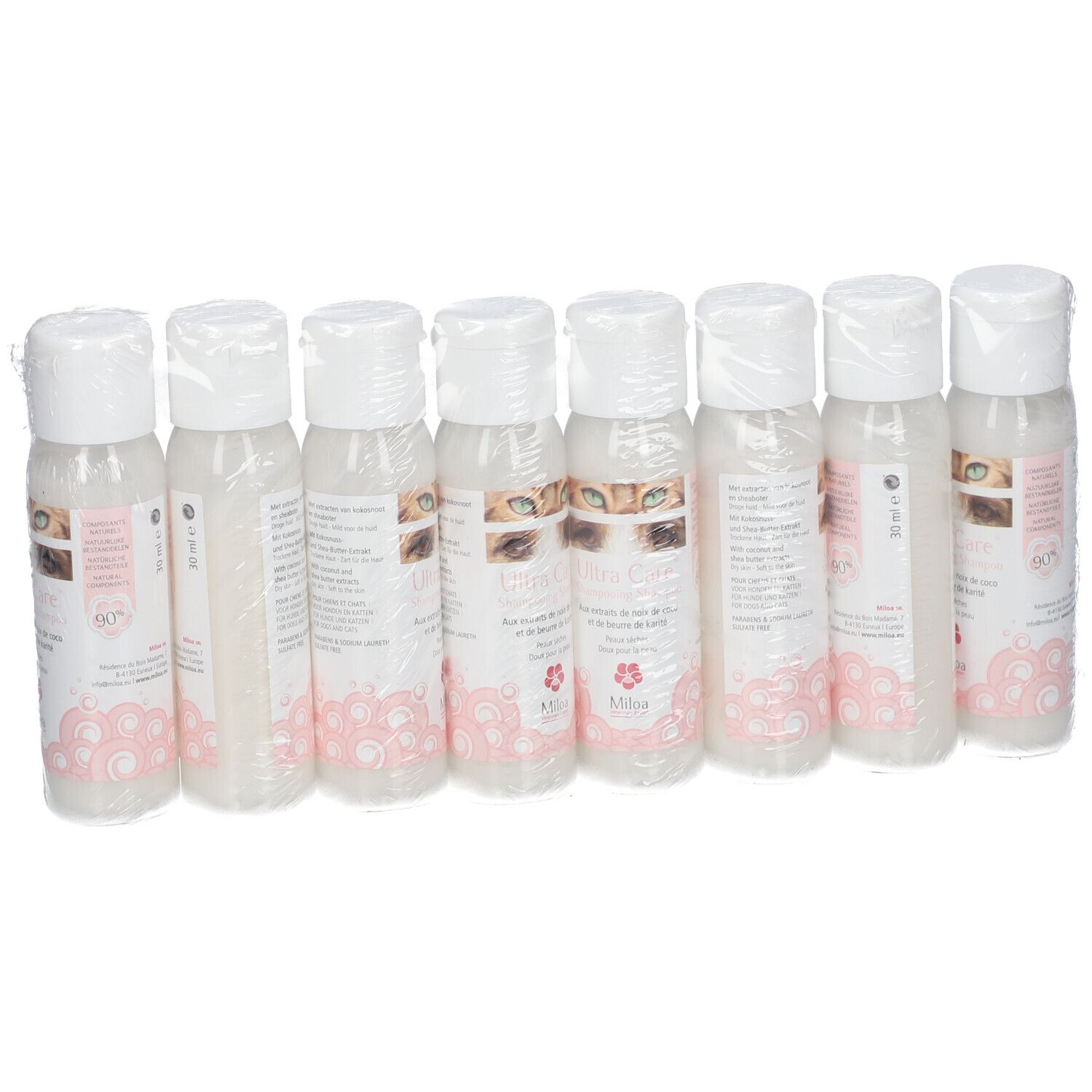 Acht Flaschen Miloa Ultra Care Shampoo, verpackt in Folie. Die Etiketten zeigen Produktnamen und Logo.