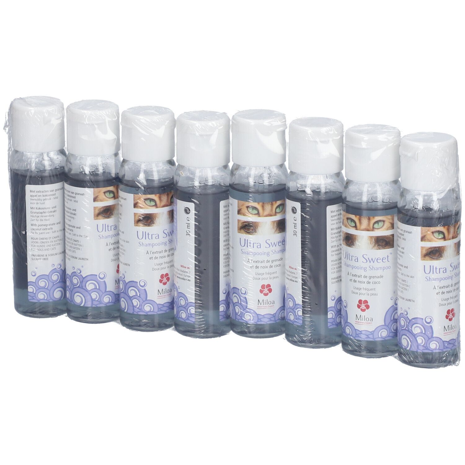 Acht Flaschen Miloa Ultra Sweet™ in Folie verpackt. Etiketten mit Produktnamen, Augenmotiv und floralem Muster.