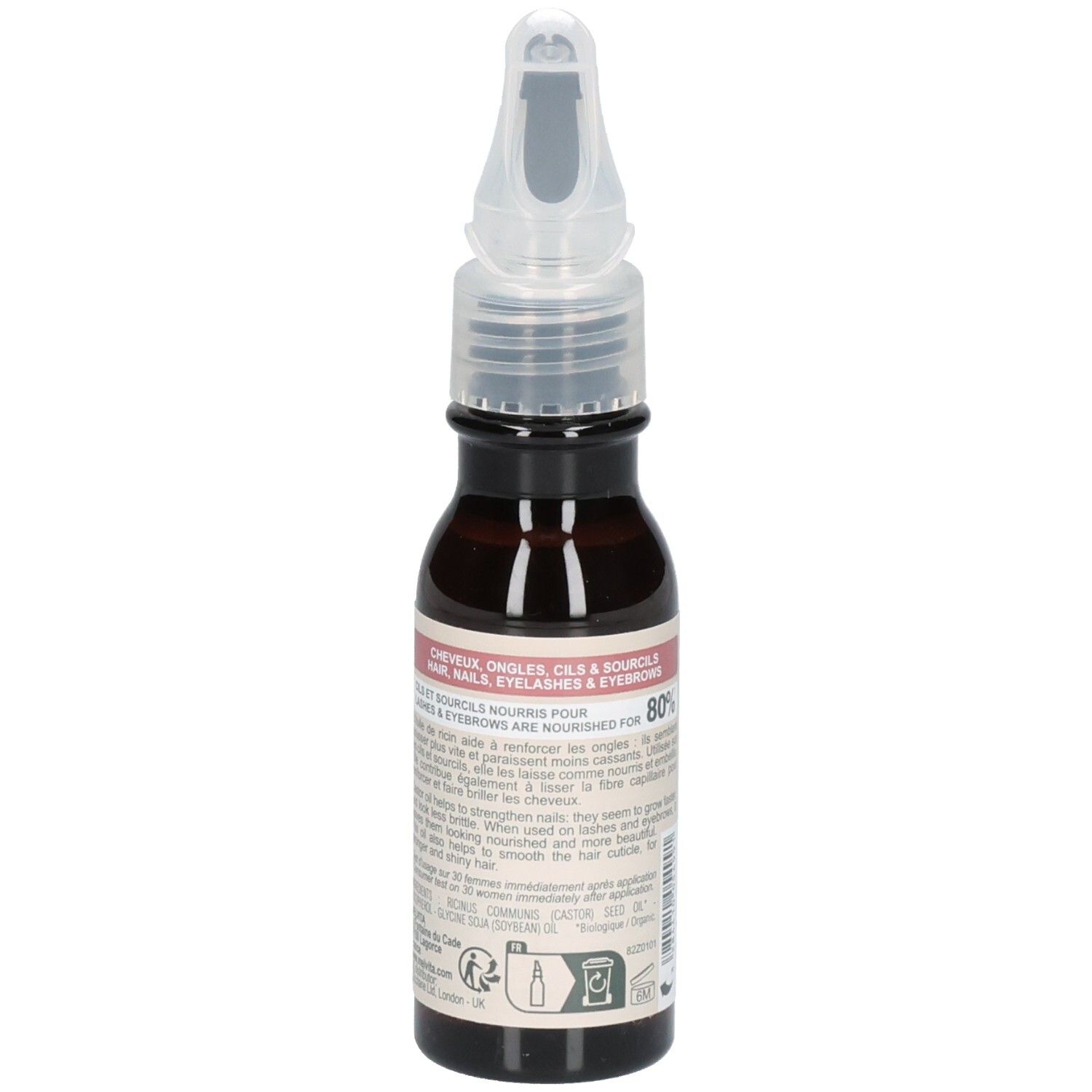 Flacon d'huile de ricin Melvita, verso. Étiquette avec instructions pour cheveux, ongles, cils et sourcils.