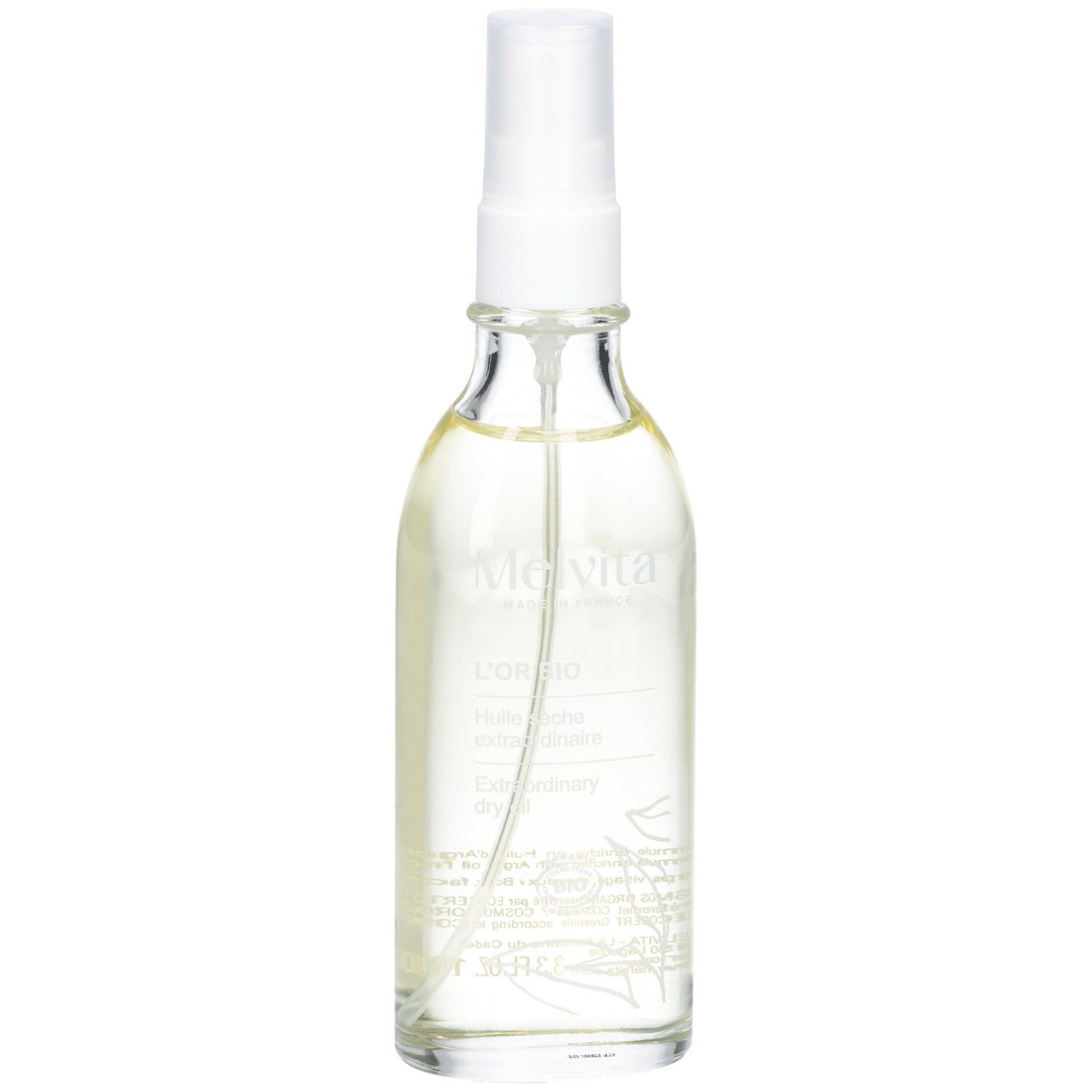 Glasflasche mit Sprühkopf. Enthält goldfarbenes Öl. Etikett mit Text.