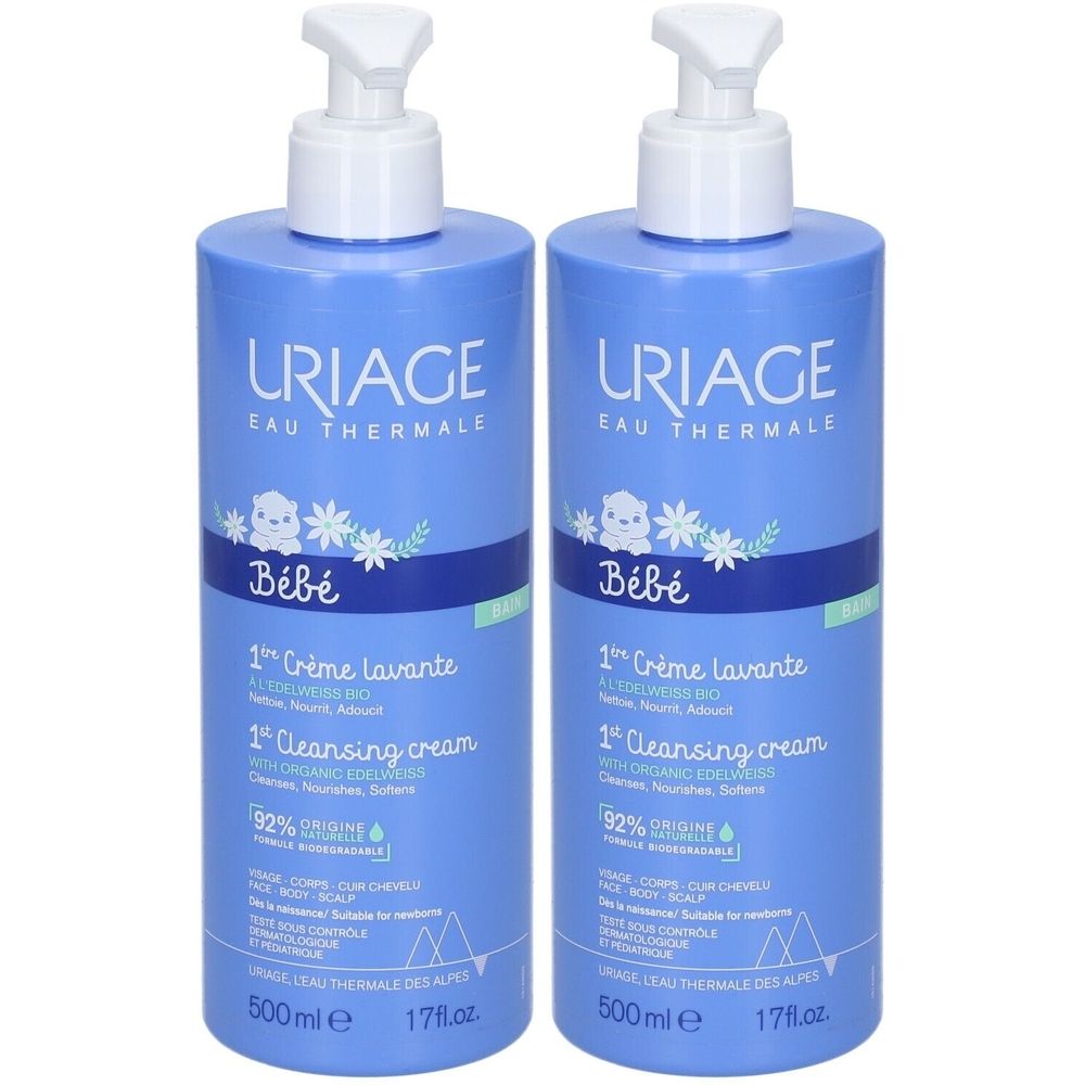 Zwei blaue Flaschen mit weißem Pumpkopf. Aufschrift: URIAGE, Bébé, 1ère Crème lavante, 1st Cleansing cream. 500ml.